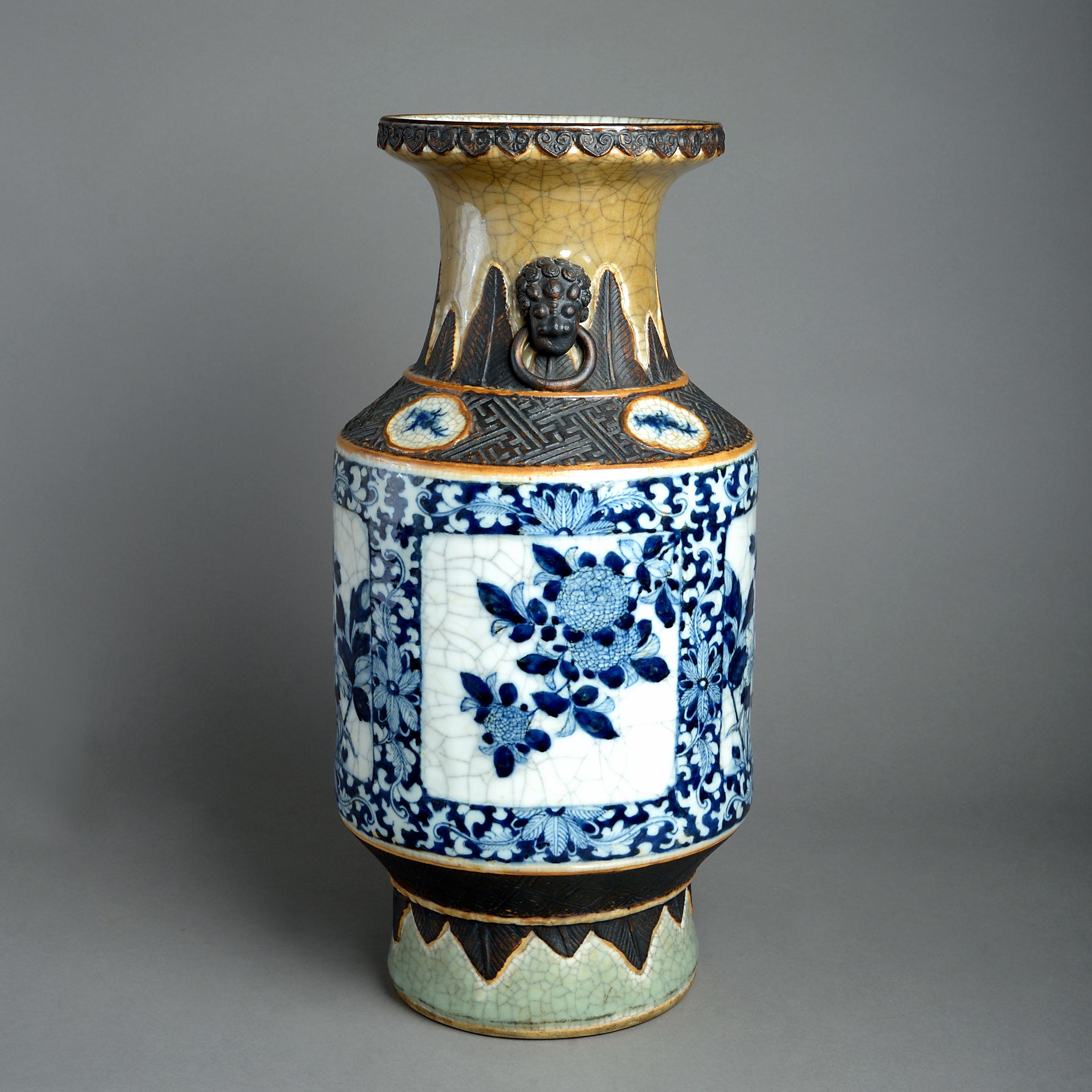A 19th century crackleware porcelain vase of good scale, decorated with caramel, celadon, blue and white glazes throughout. 

Qing Dynasty
    