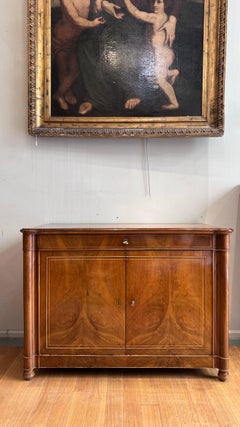 19th Century Charles X walnut and lemon sideboards