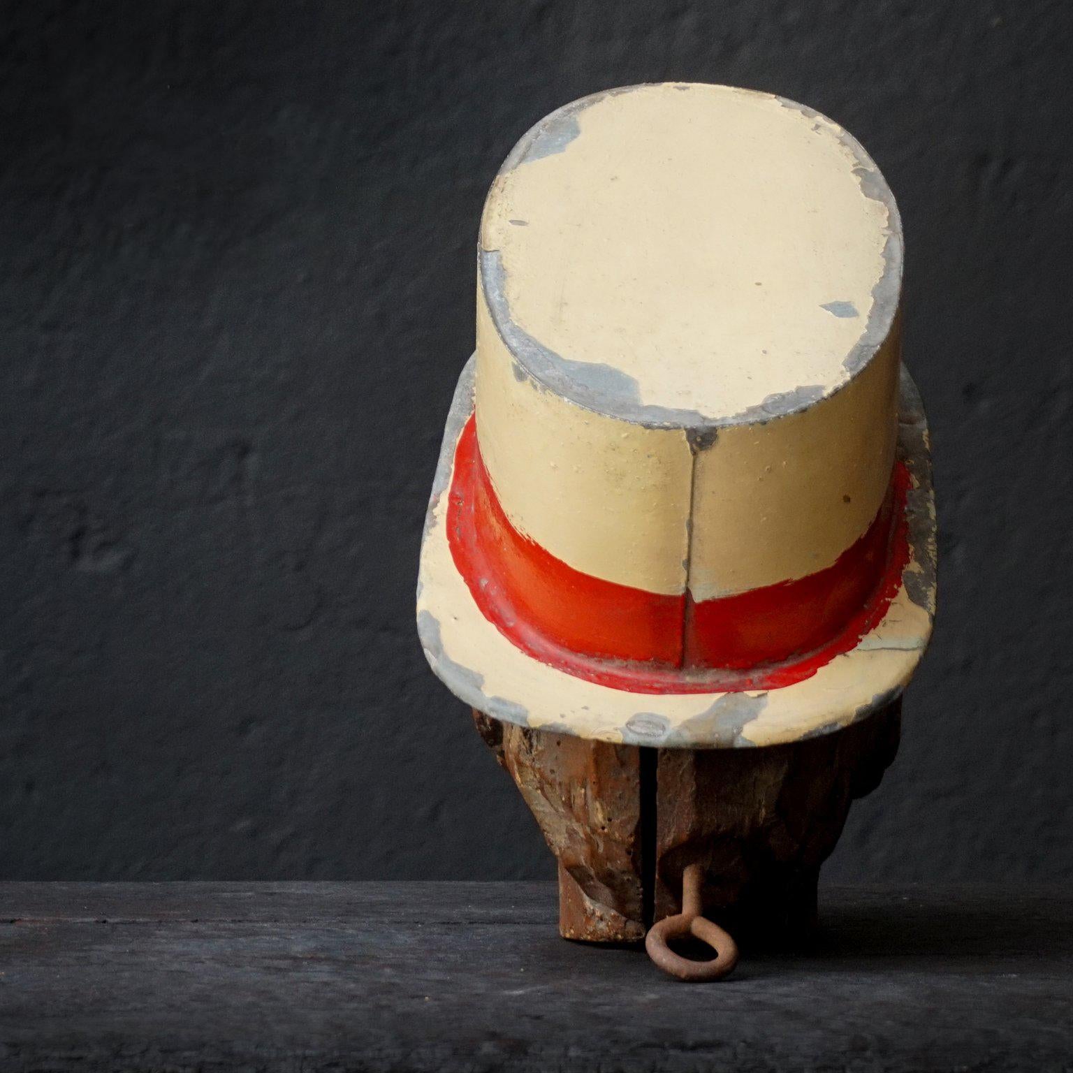 Unknown 19th Century Carnival Folk Art Carved Wooden Head with Zinc Hat For Sale