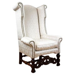 Sillón con respaldo de ala estilo caroleano del siglo XIX