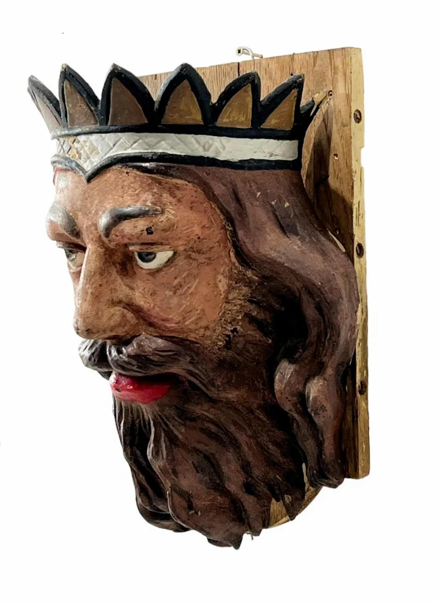 A rare European antique hand painted cast iron carnival carousel embellishment.

Once decorating a 19th century country fair carousel amusement ride, the sculptural ornament depicting a medieval European king with crown, wavy hair, and richly