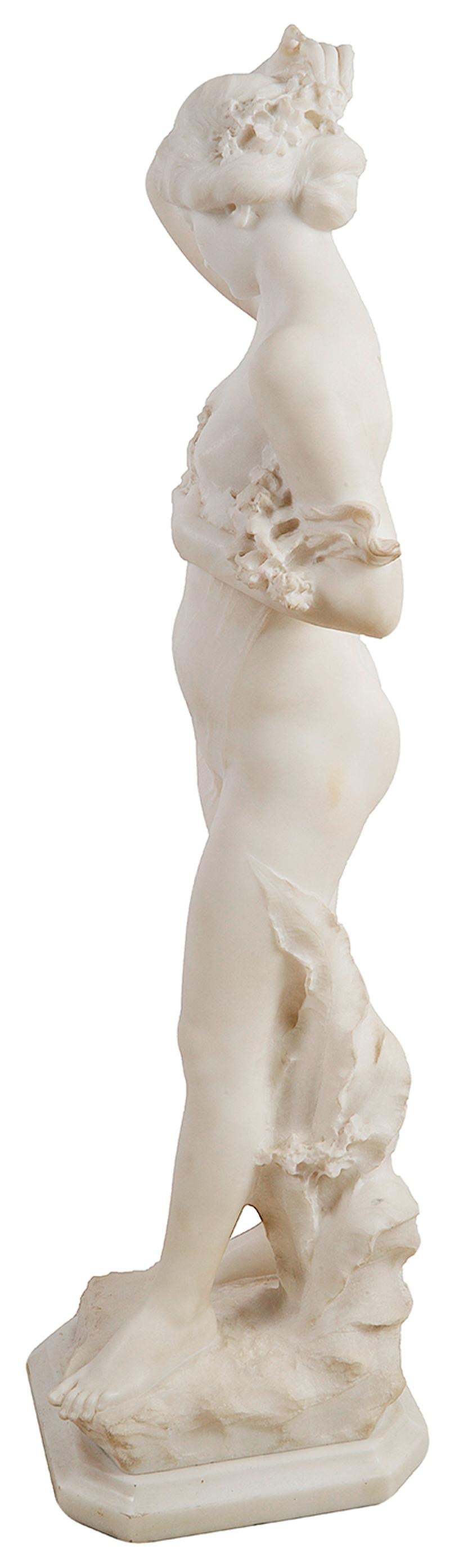 A fine quality 19th century Carrara marble study of a nude Nymph holding flowers by Pietro Bazzanti. Measures: 103cm(40.5