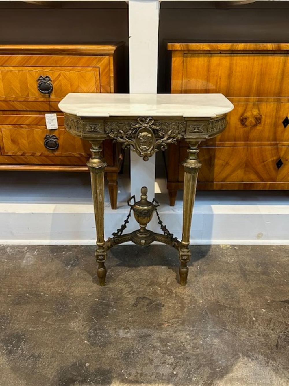 Elegant 19th century carved and giltwood Neo-Classical console with original marble top. Note the exceptional carving on this piece! A true work of art!