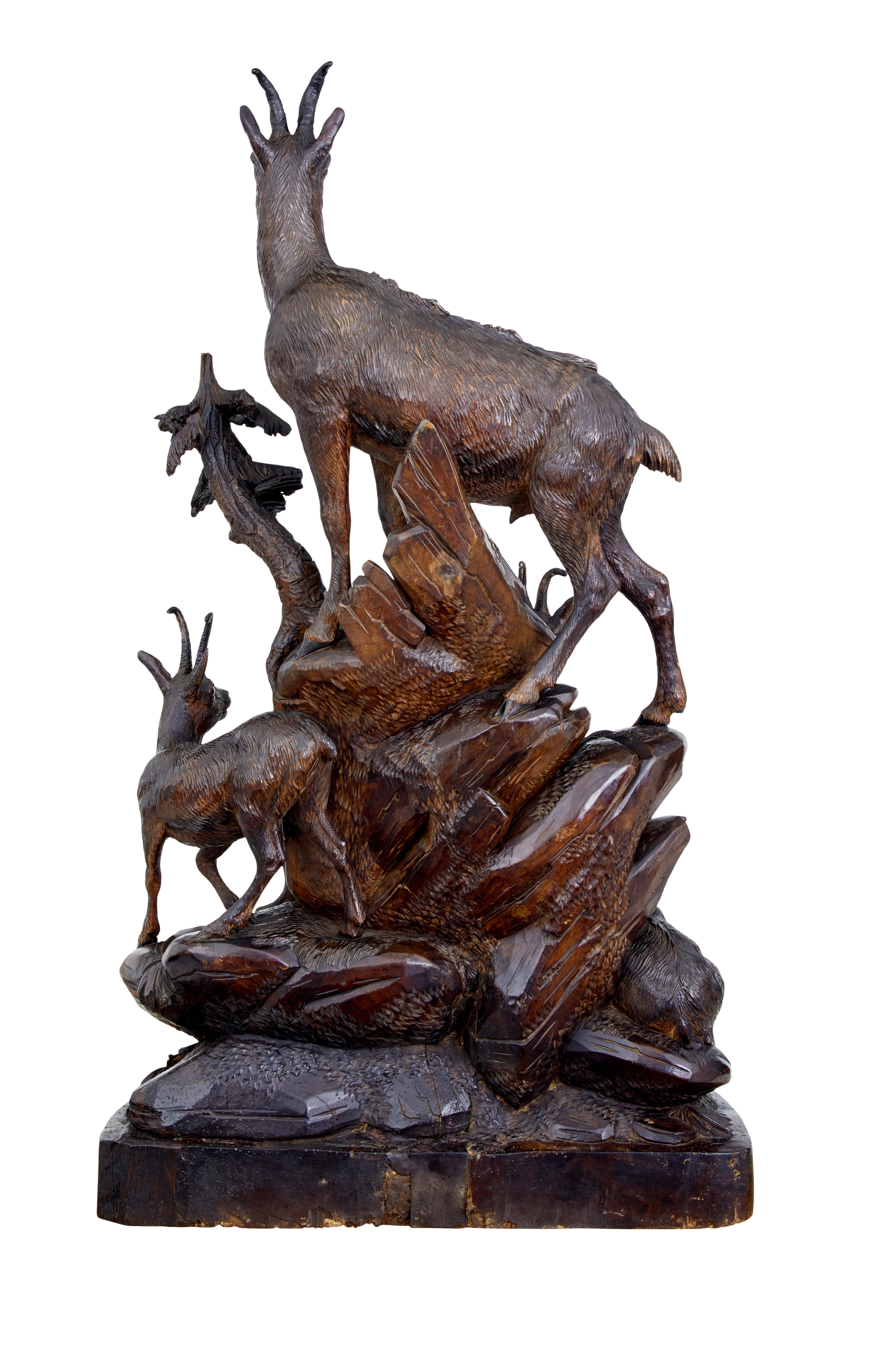 Carved 19th century carved black forest ibex sculpture linden wood For Sale