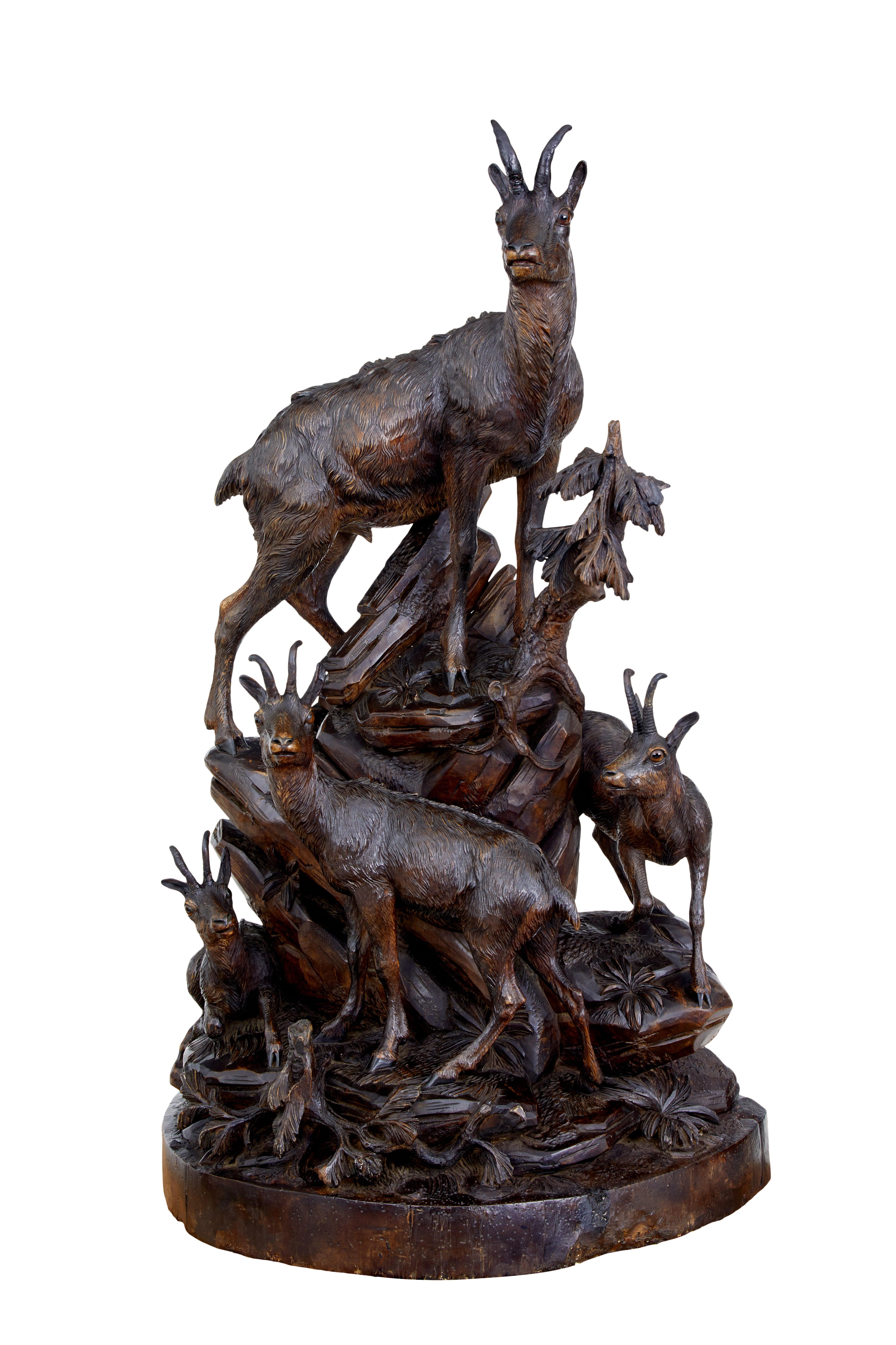Oak 19th century carved black forest ibex sculpture linden wood For Sale