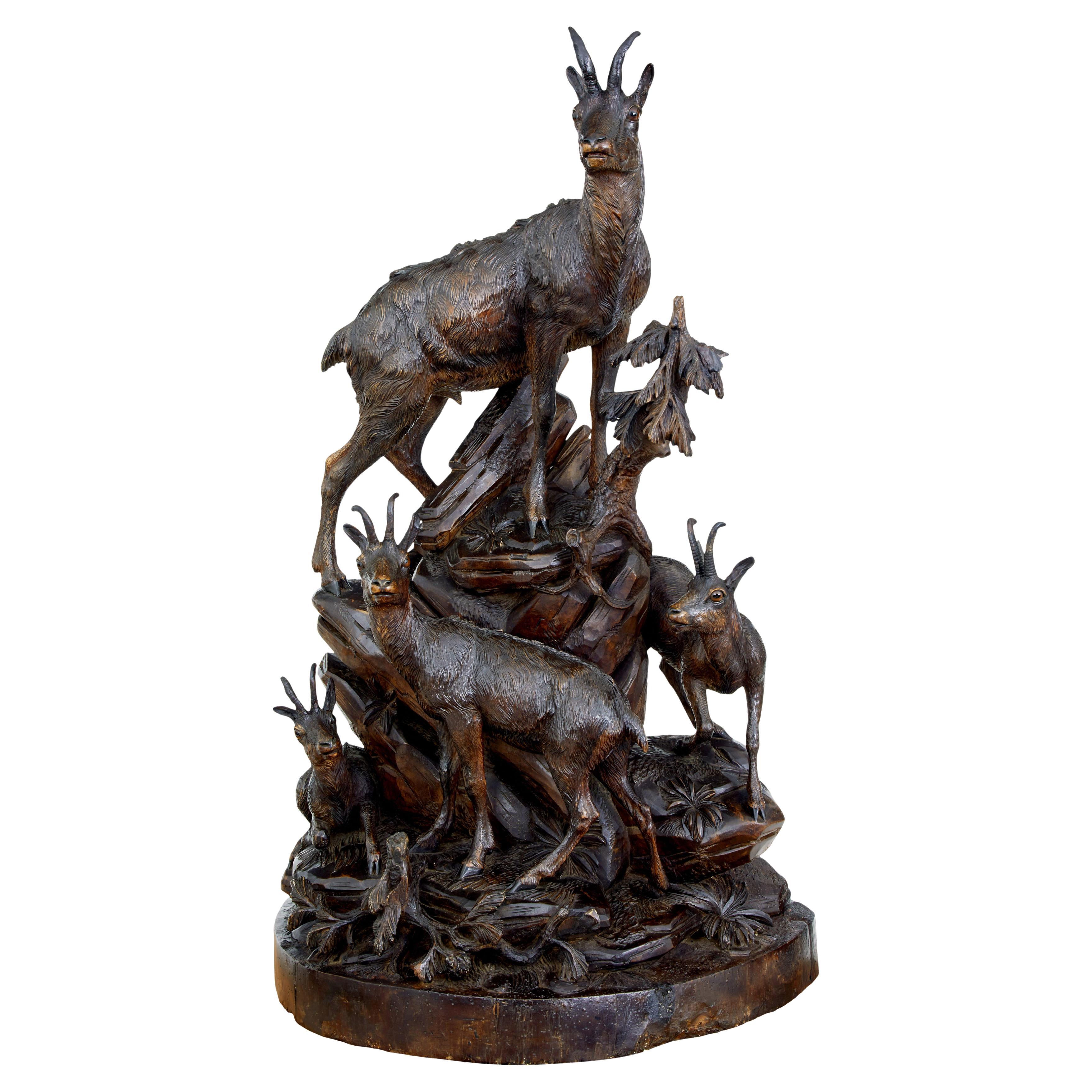 19th century carved black forest ibex sculpture linden wood For Sale