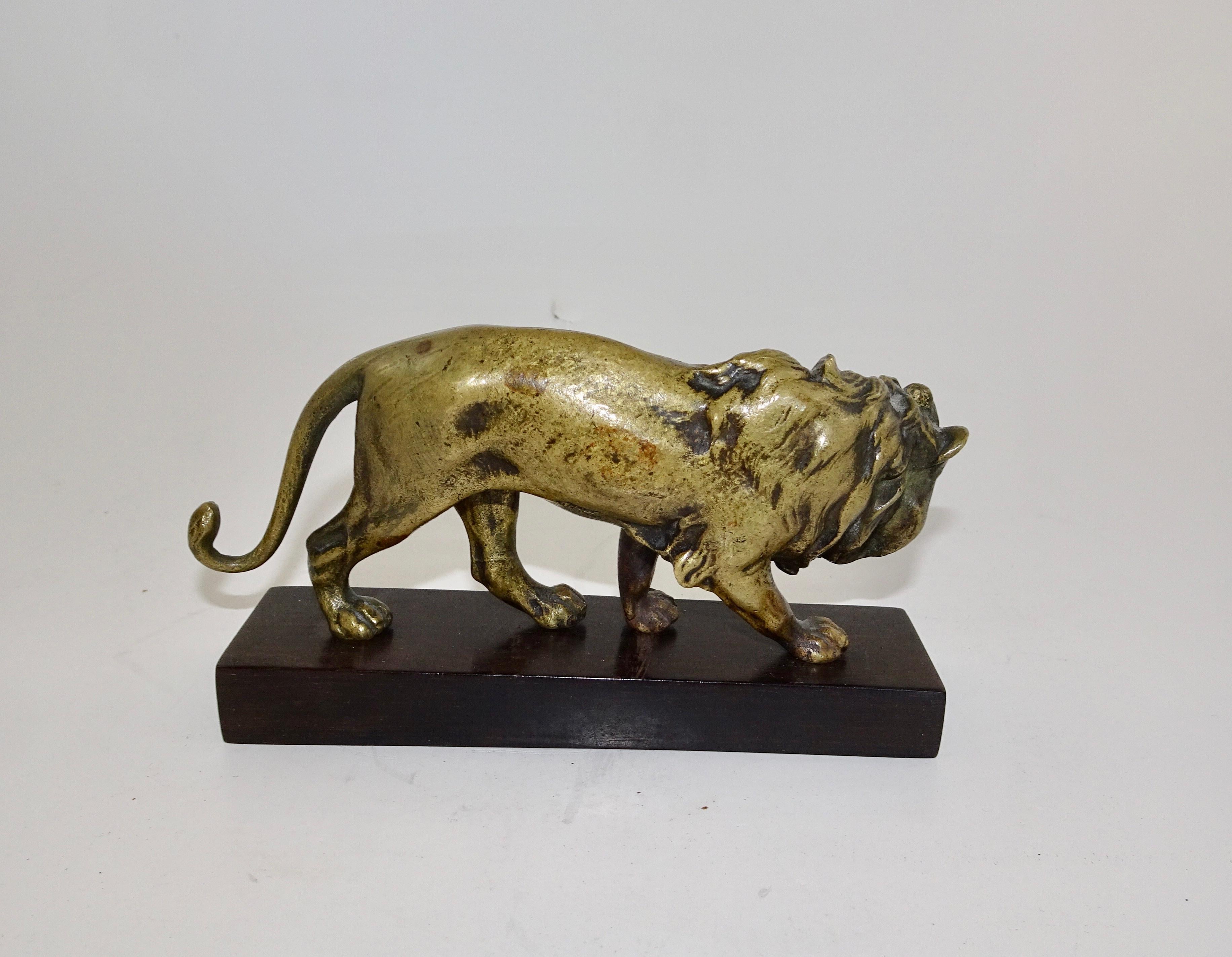 19th Century Carved Bronze Statue of Lion on Wooden Base In Good Condition For Sale In Nashville, TN