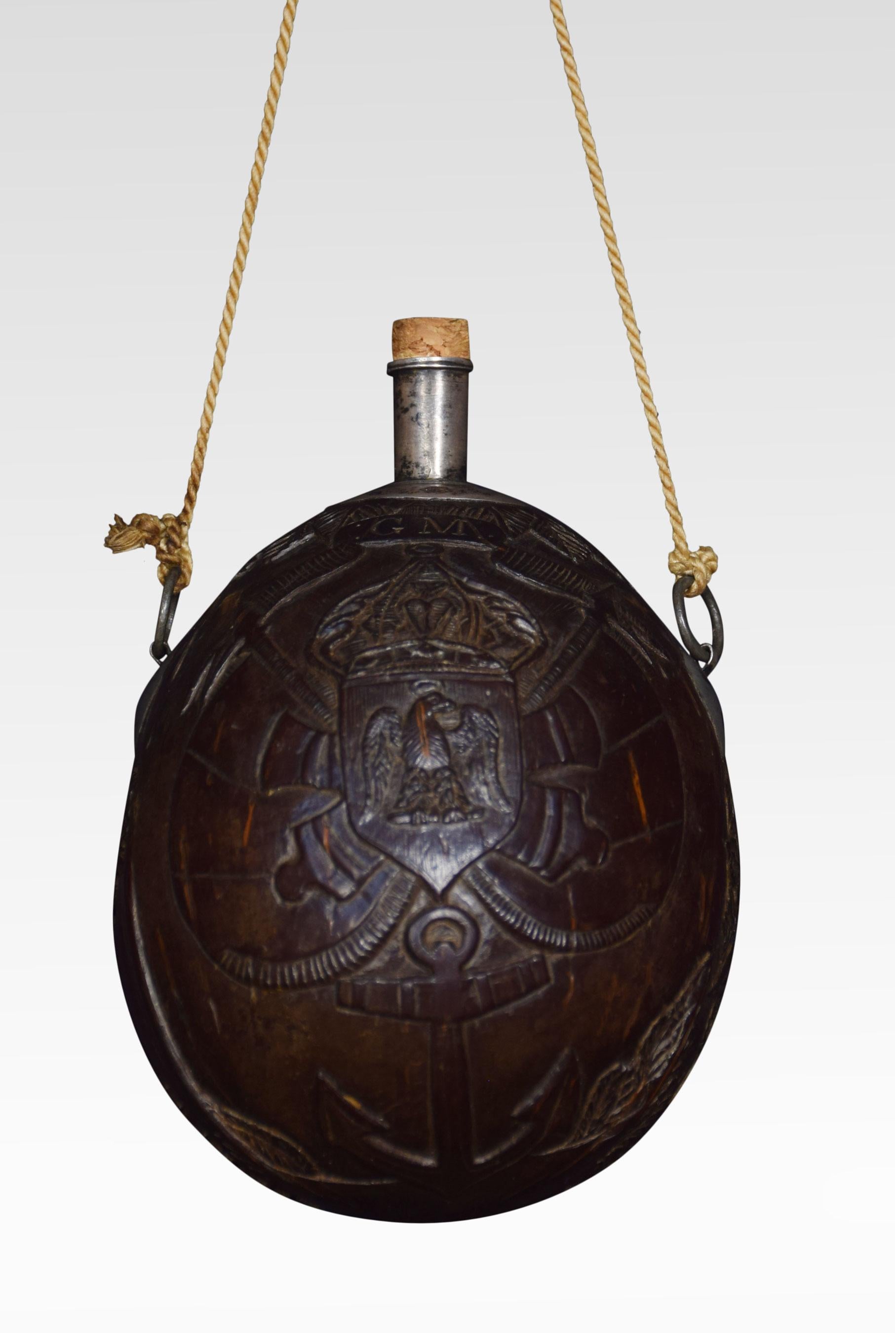 19th century carved bug bear coconut flask, having relief carved all over with portrait of a sailor and naval crest with crossed cannons.
Dimensions
Height 5.5 inches
Width 4 inches
Depth 4 inches.