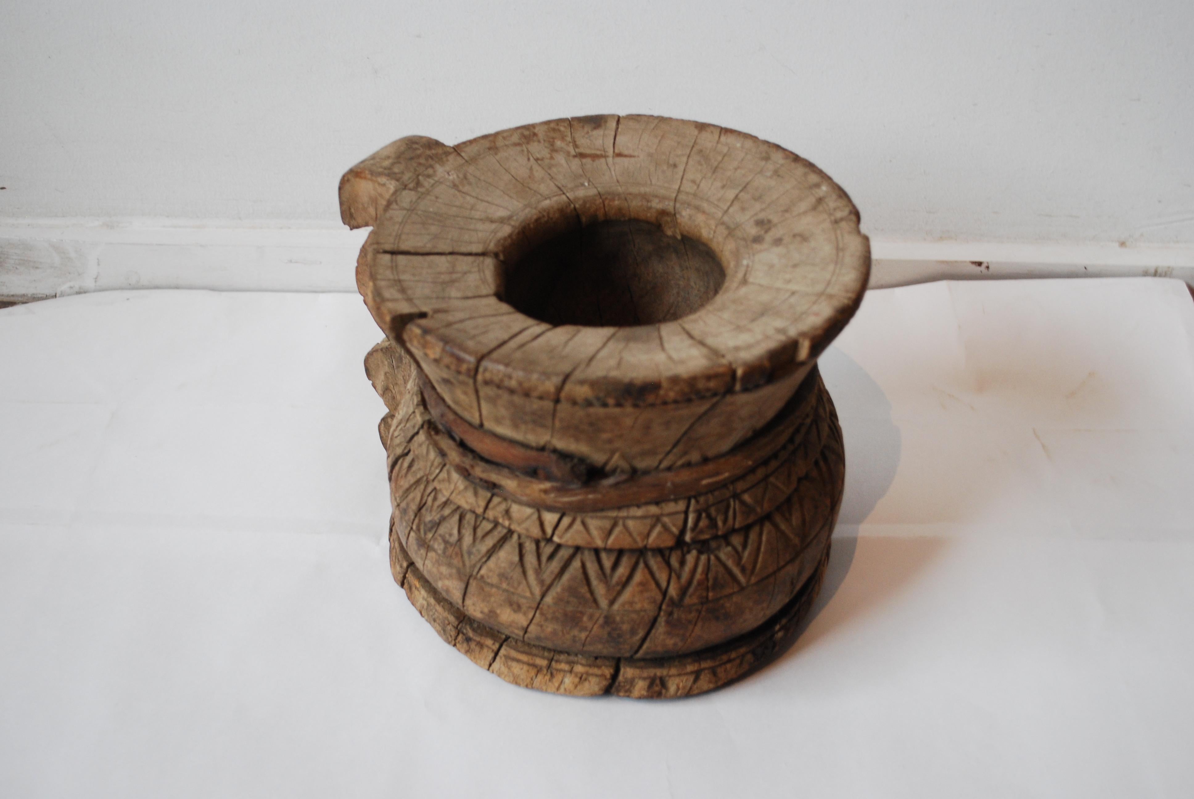 19th century carved Burmese water vessel with handle.