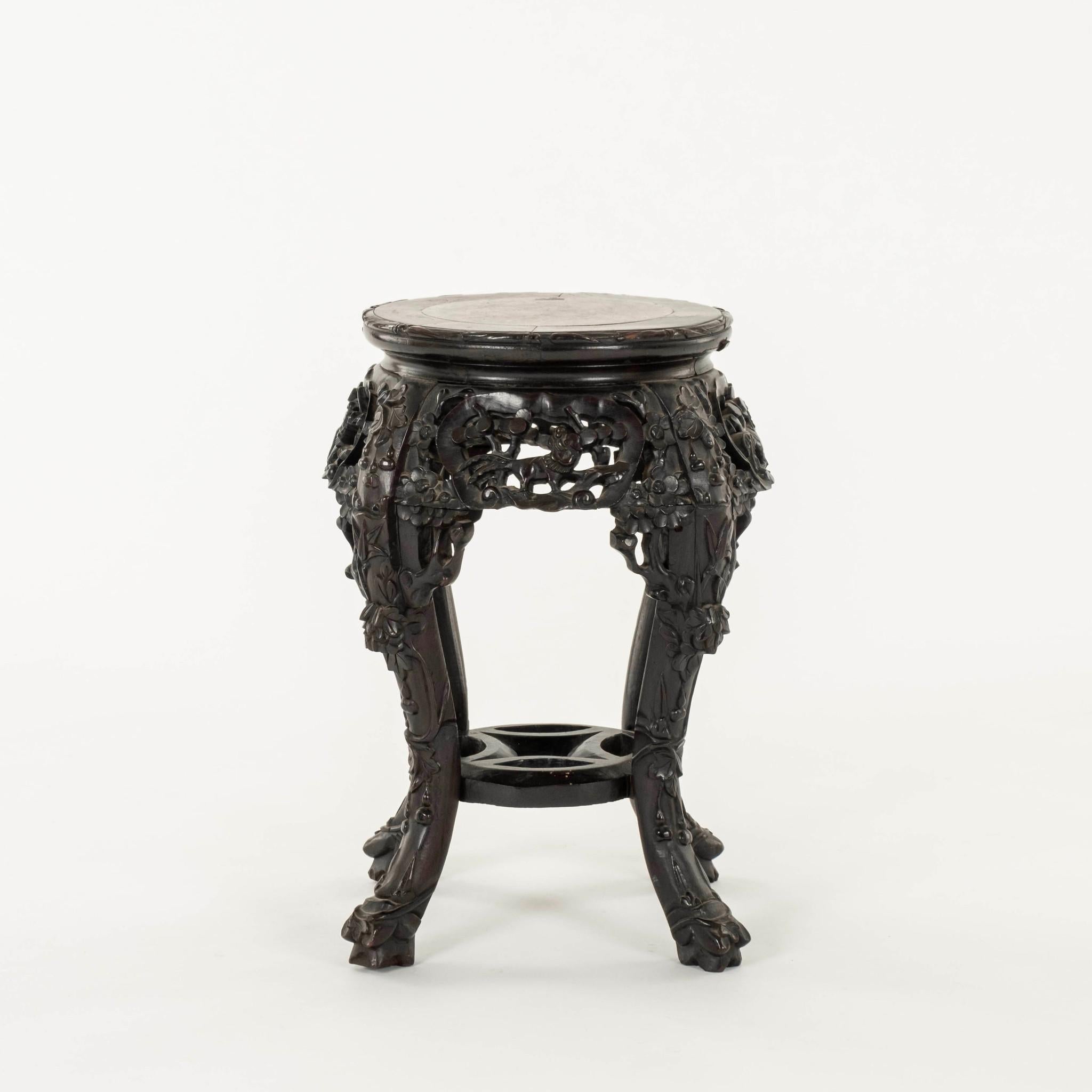 19th Century rosewood side table with marble top and heavily carved cherry blossoms.