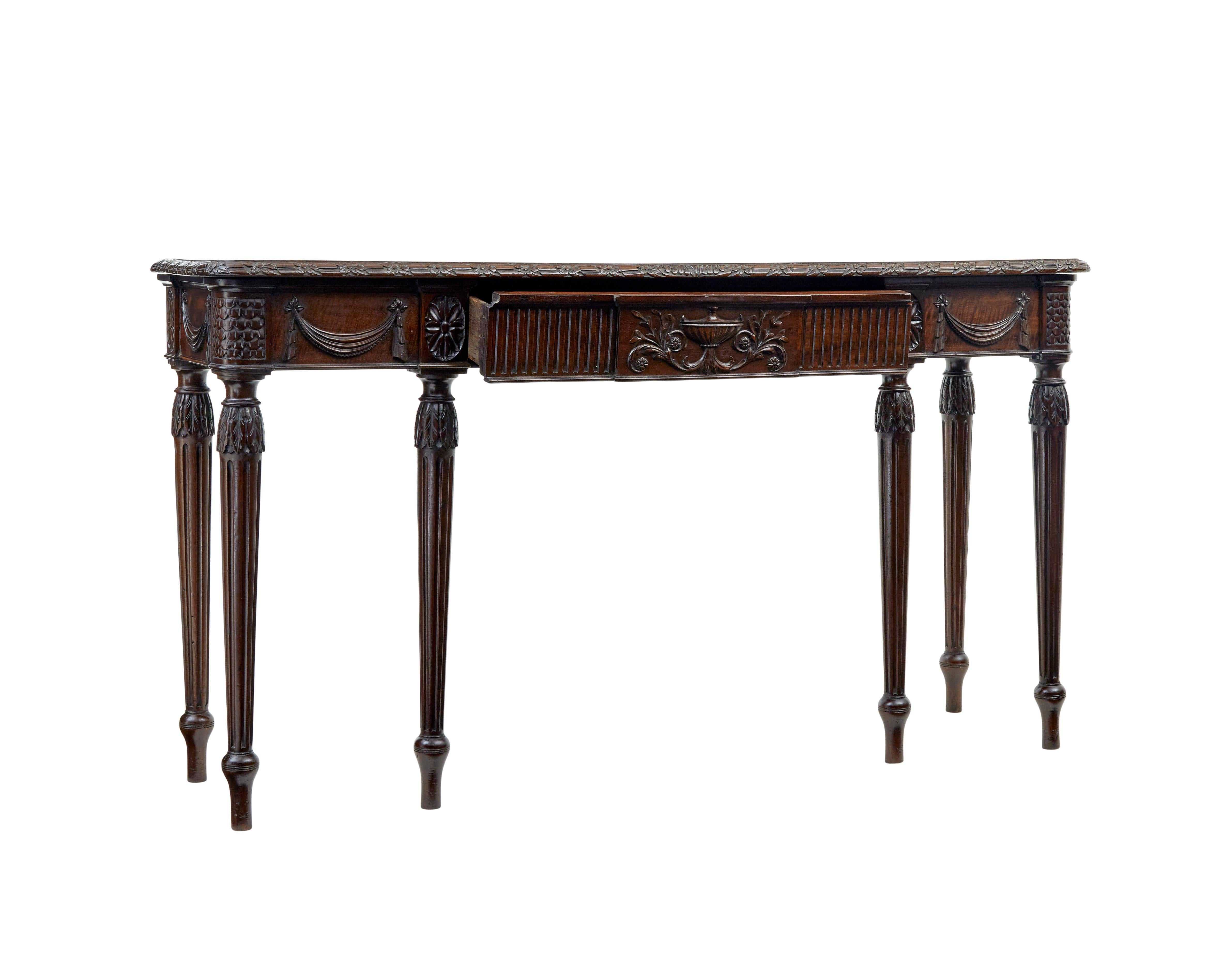 19th century carved console table in the adams taste circa 1890.

Here we have an elegant console table from the 19th century in carved mahogany in the adams style.

Rectangular top with a delicately carved moulded edge.  Deep apron which contains a