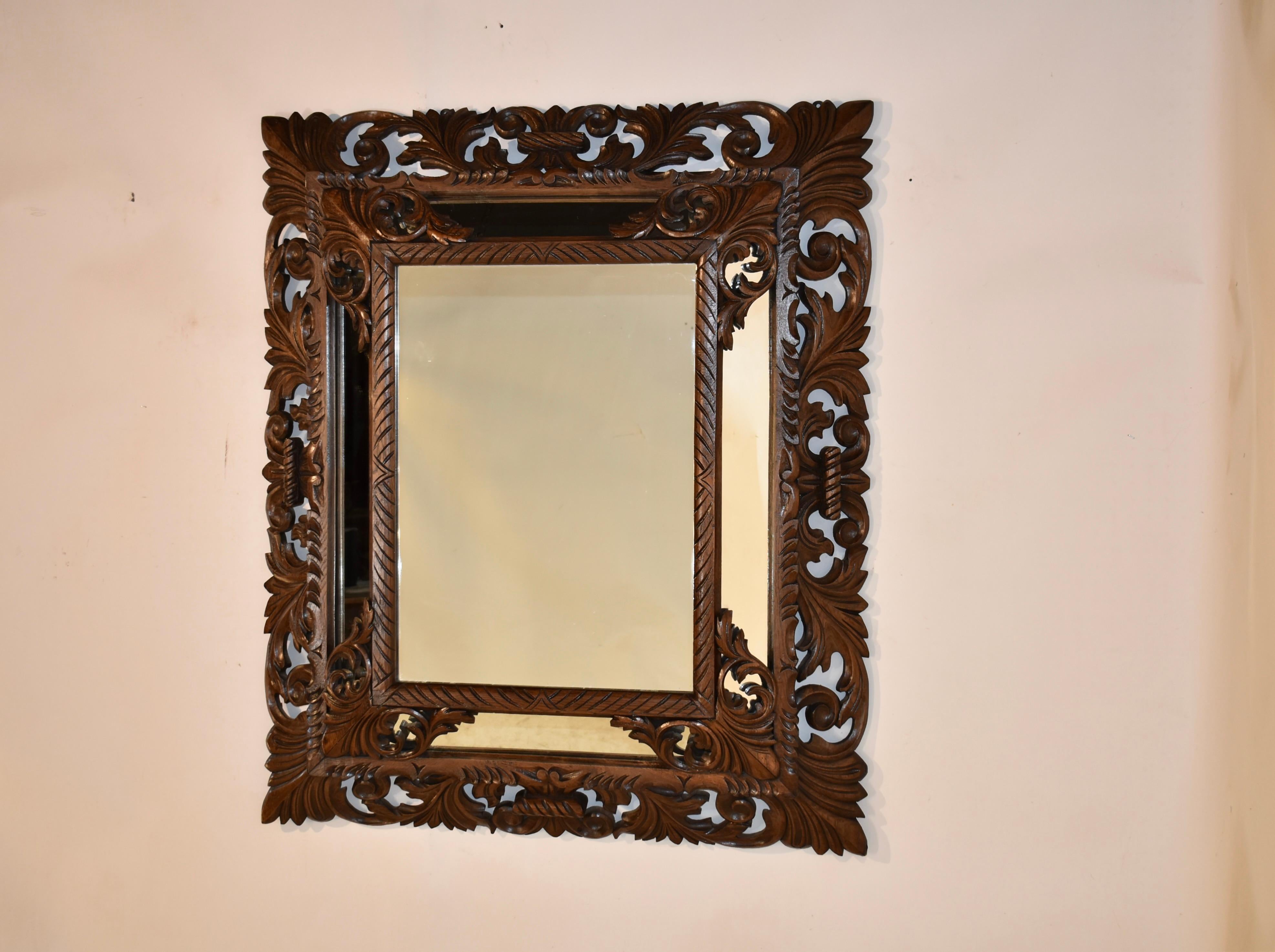 French 19th Century Carved Cushion Wall Mirror For Sale
