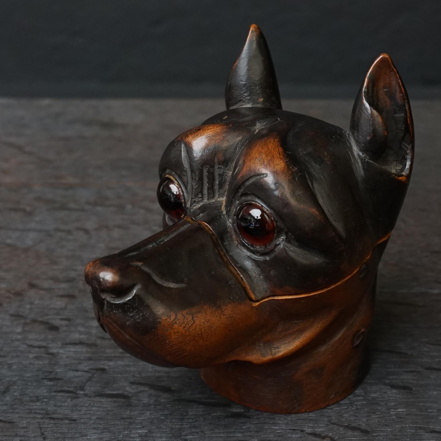 Beautiful original 19th century carved heavy wooden Victorian era dog inkwell with hinged head that opens to reveal the inkwell inside. Made of heavy Lignum Vitae or Pockwood.

Lignum vitae is Latin for wood of life. Its resin has been used to