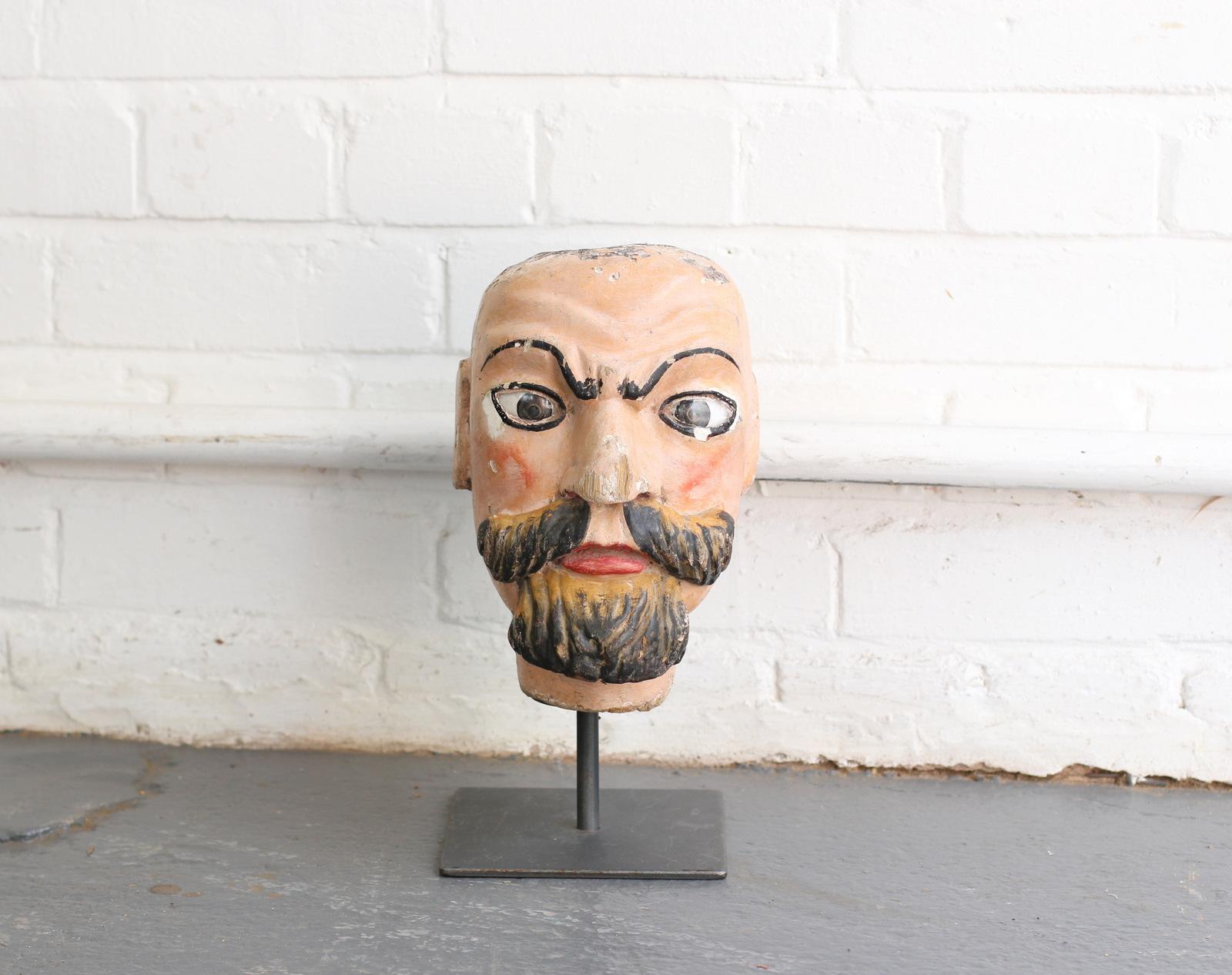 19th century carved fairground head by Emmanuel Fremiet.

- Glass eyes
- Original paint 
- Modern steel mount
- By French sculptor Emmanuel Fremiet
- French, circa 1850-1860.
- Measures: 34cm tall x 16cm wide x 20cm deep.

Condition