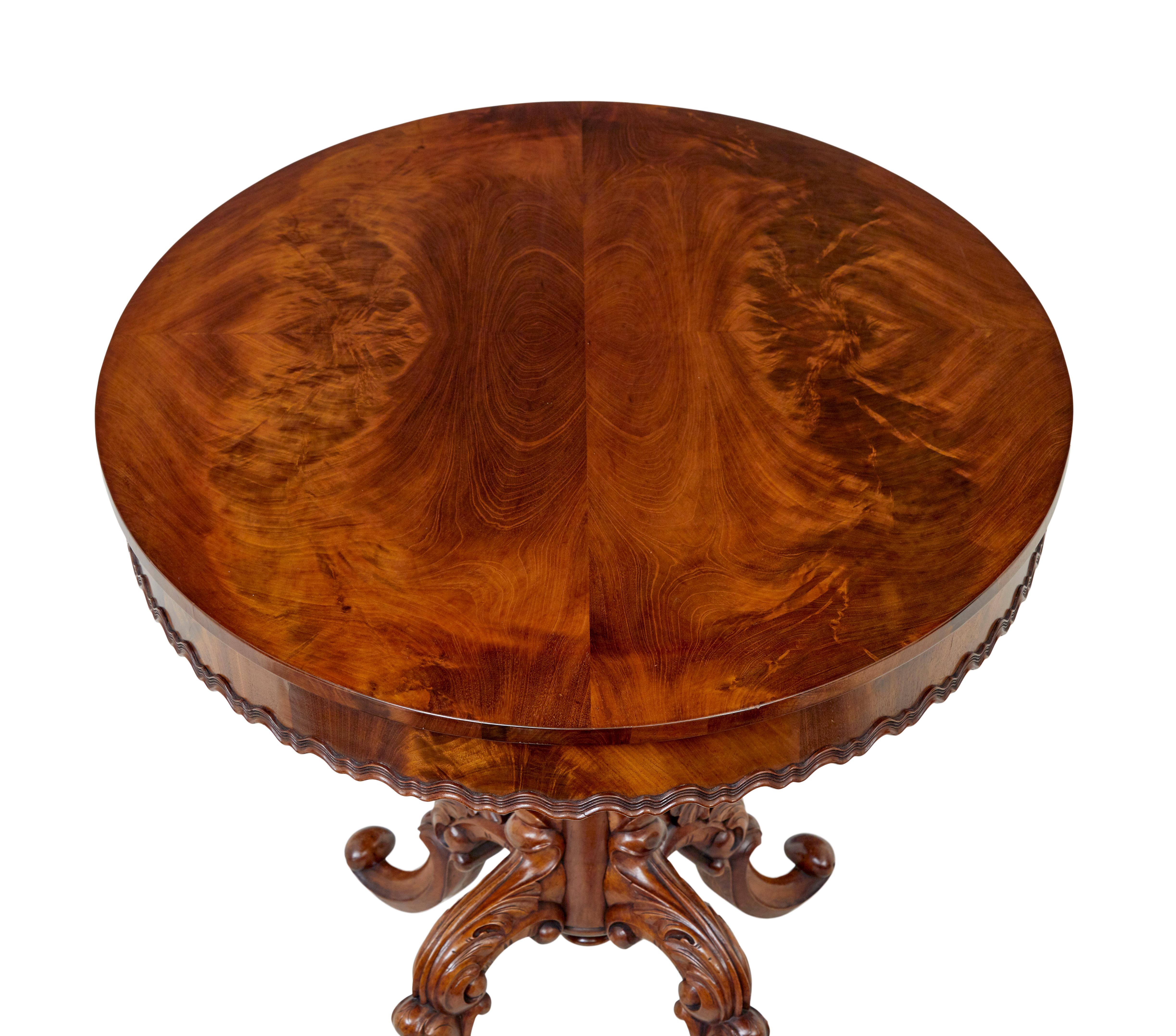 19th Century carved flame mahogany oval center table For Sale 2