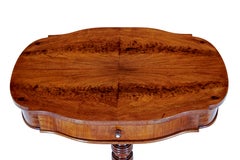 19th century carved flame mahogany side table