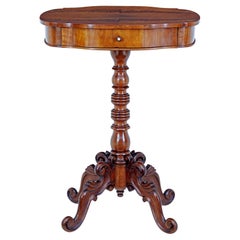 19th century carved flame mahogany side table