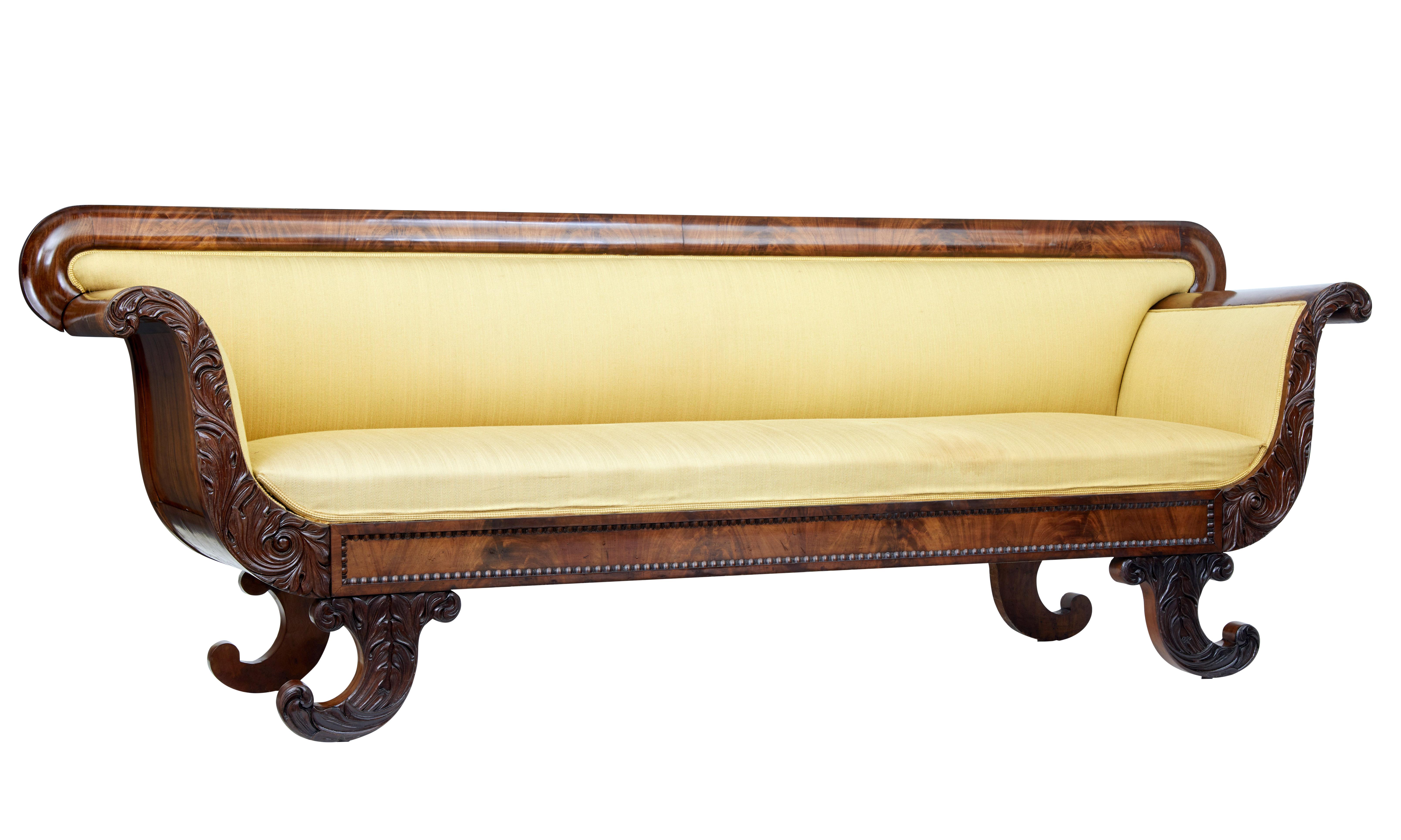 Beautiful Swedish mid-19th century mahogany sofa, circa 1860.

Classic Swedish design with scrolling arms and paneled sides in flame mahogany. Shaped back rest.

Carved acanthus leaves to the front of the arms with a beaded front rail, which is