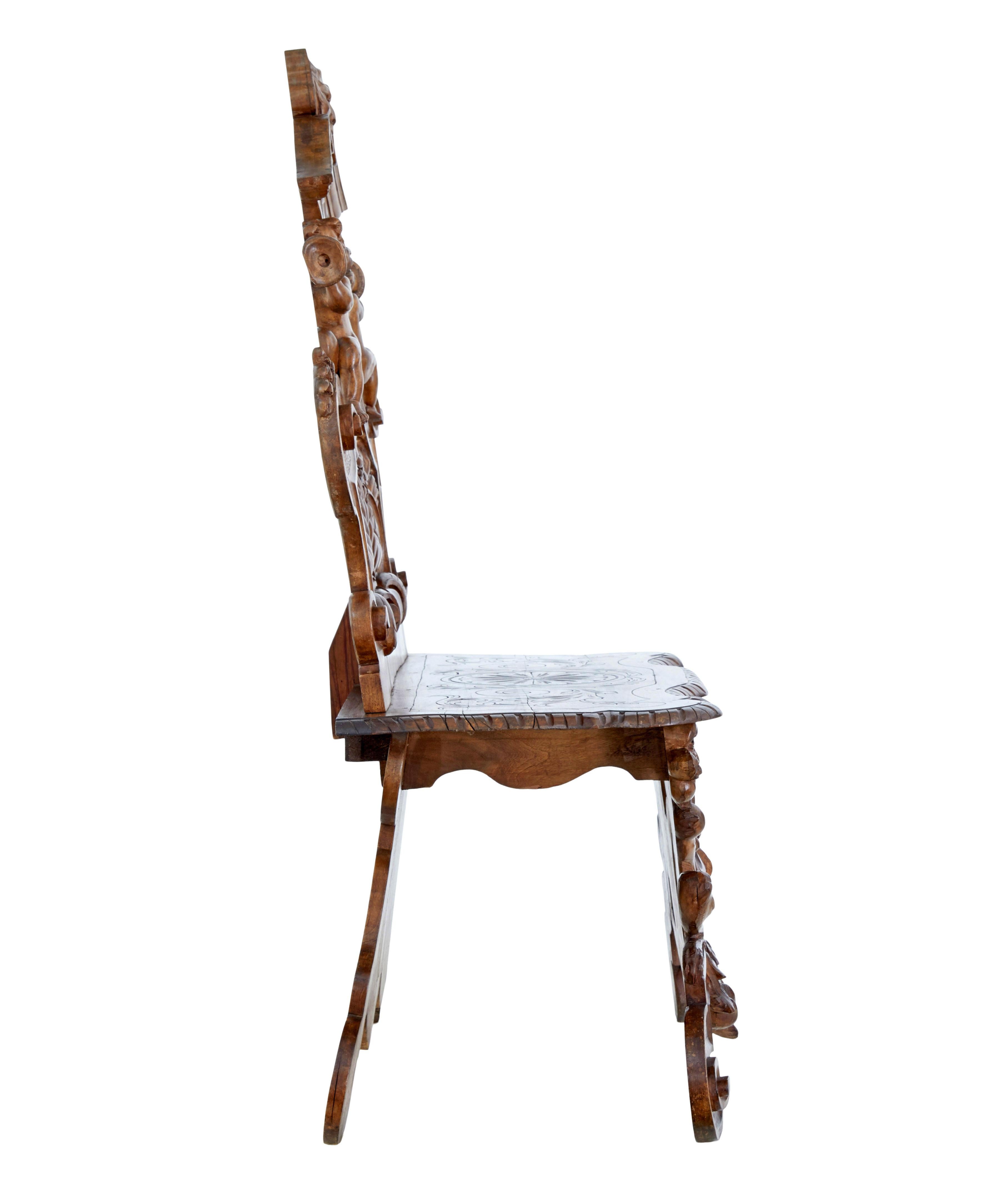 Hand-Carved 19th century carved Flemish walnut decorative chair For Sale