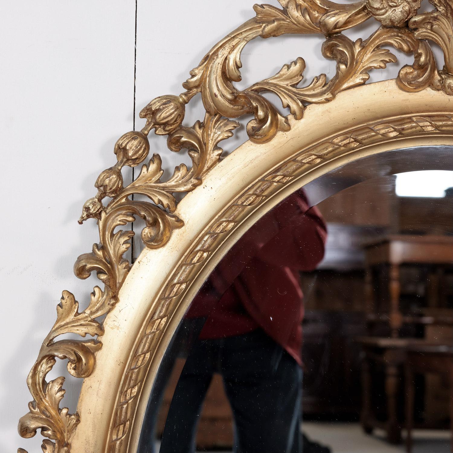 Late 19th Century 19th Century Carved French Louis XVI Style Oval Shaped Giltwood Mirror For Sale