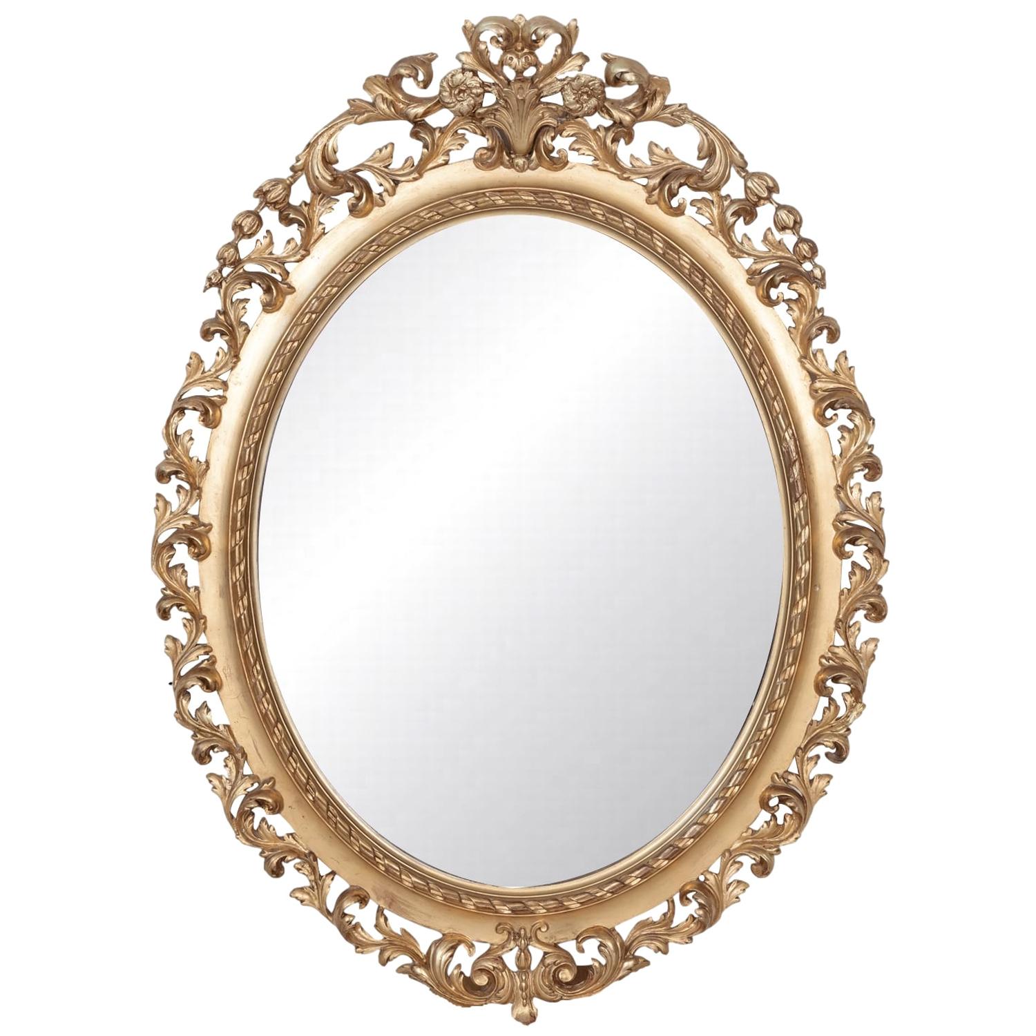 19th Century Carved French Louis XVI Style Oval Shaped Giltwood Mirror
