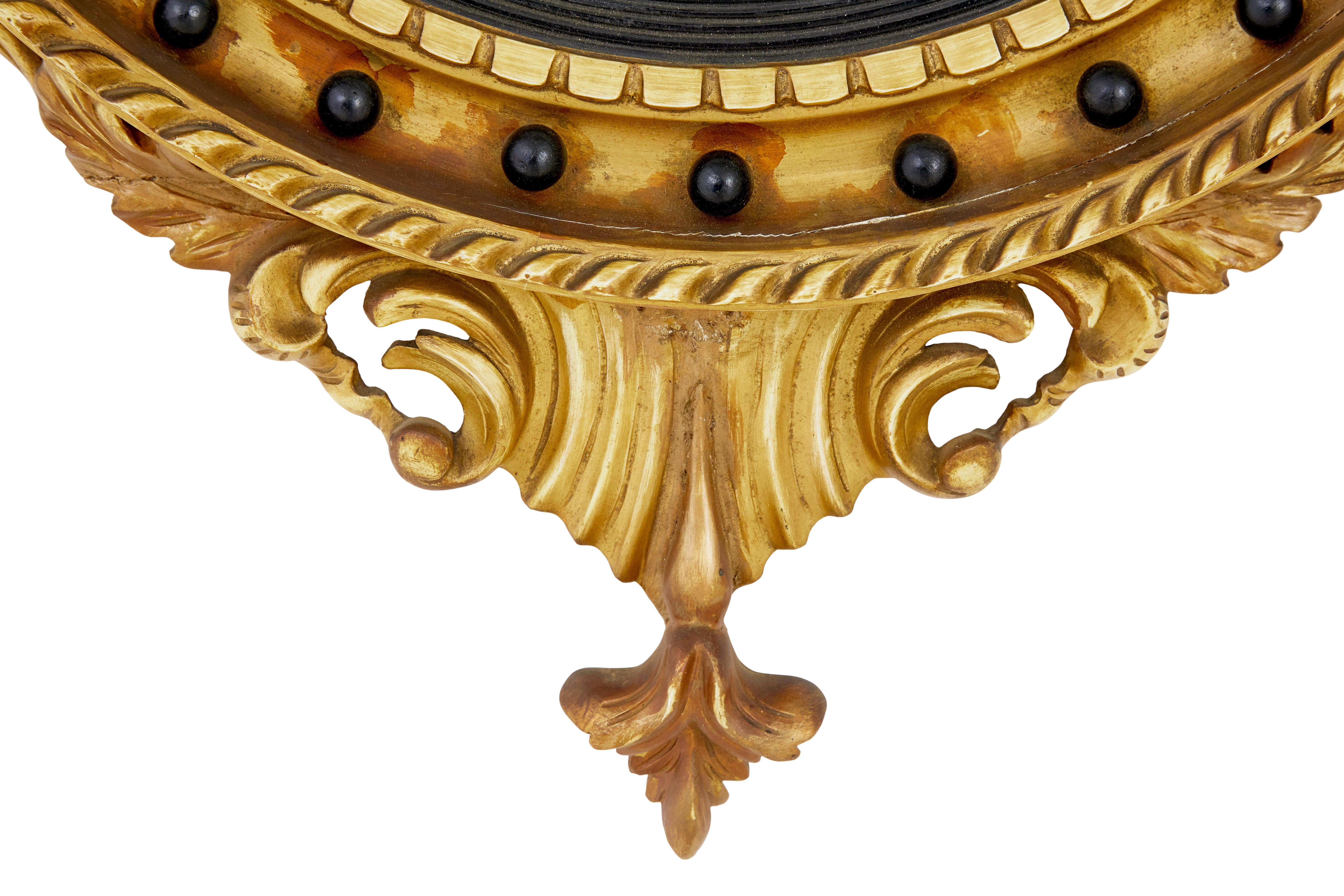 Carved 19th Century carved gilt convex mirror