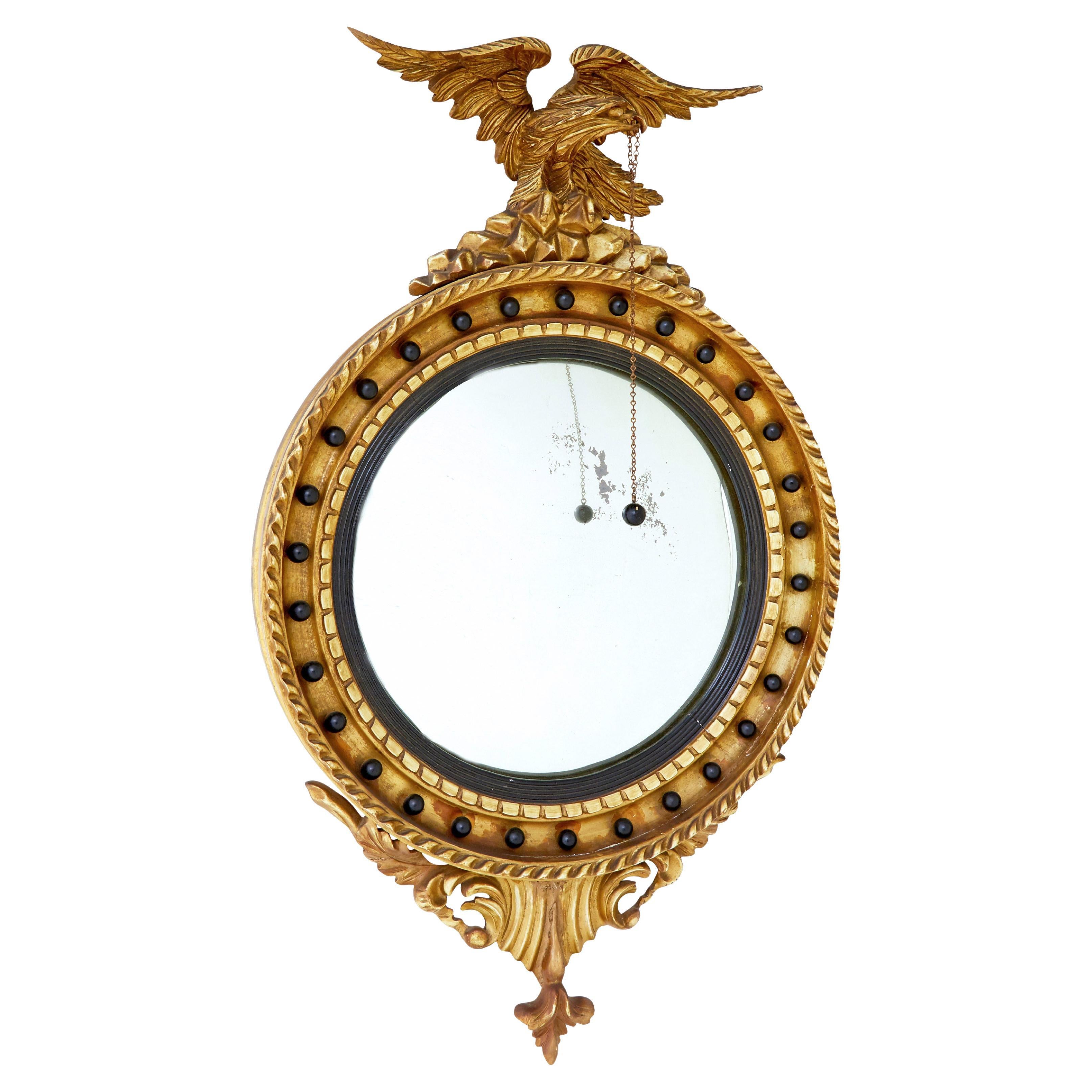 19th Century carved gilt convex mirror
