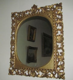 19th Century Carved Gilt Wood Florentine Framed Oval Wall Mirror