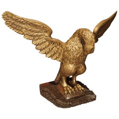 aigle en bois doré sculpté du 19ème siècle sur pied