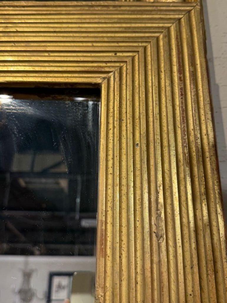 French 19th Century Carved Giltwood Transitional Mirror For Sale
