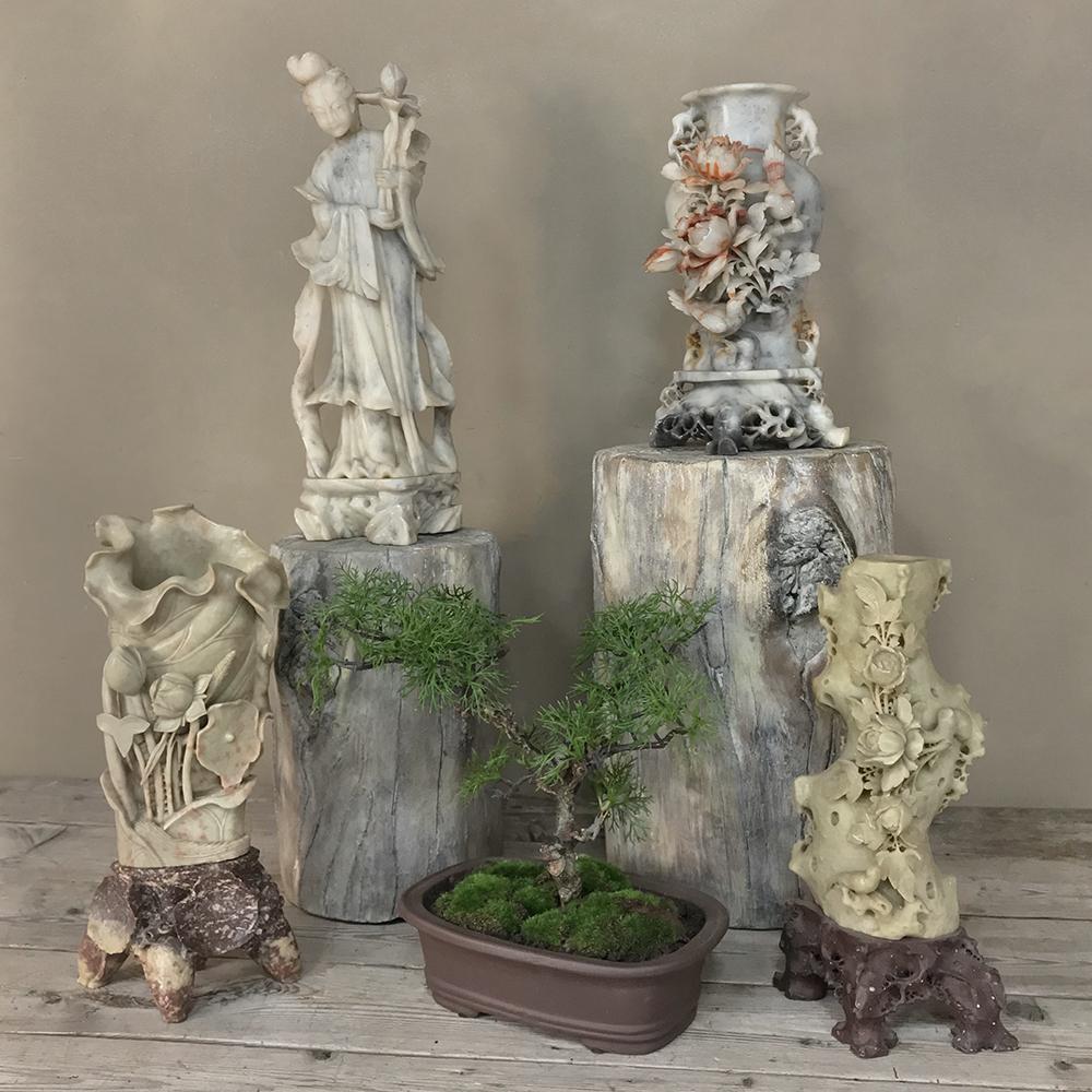 19th century carved jade stone vase is a beautifully sculpted rendition of a pitcher plant, where the artist has taken advantage of the natural beauty of the stone.
circa 1880s
Measures 14 H x 7 W x 4 D.