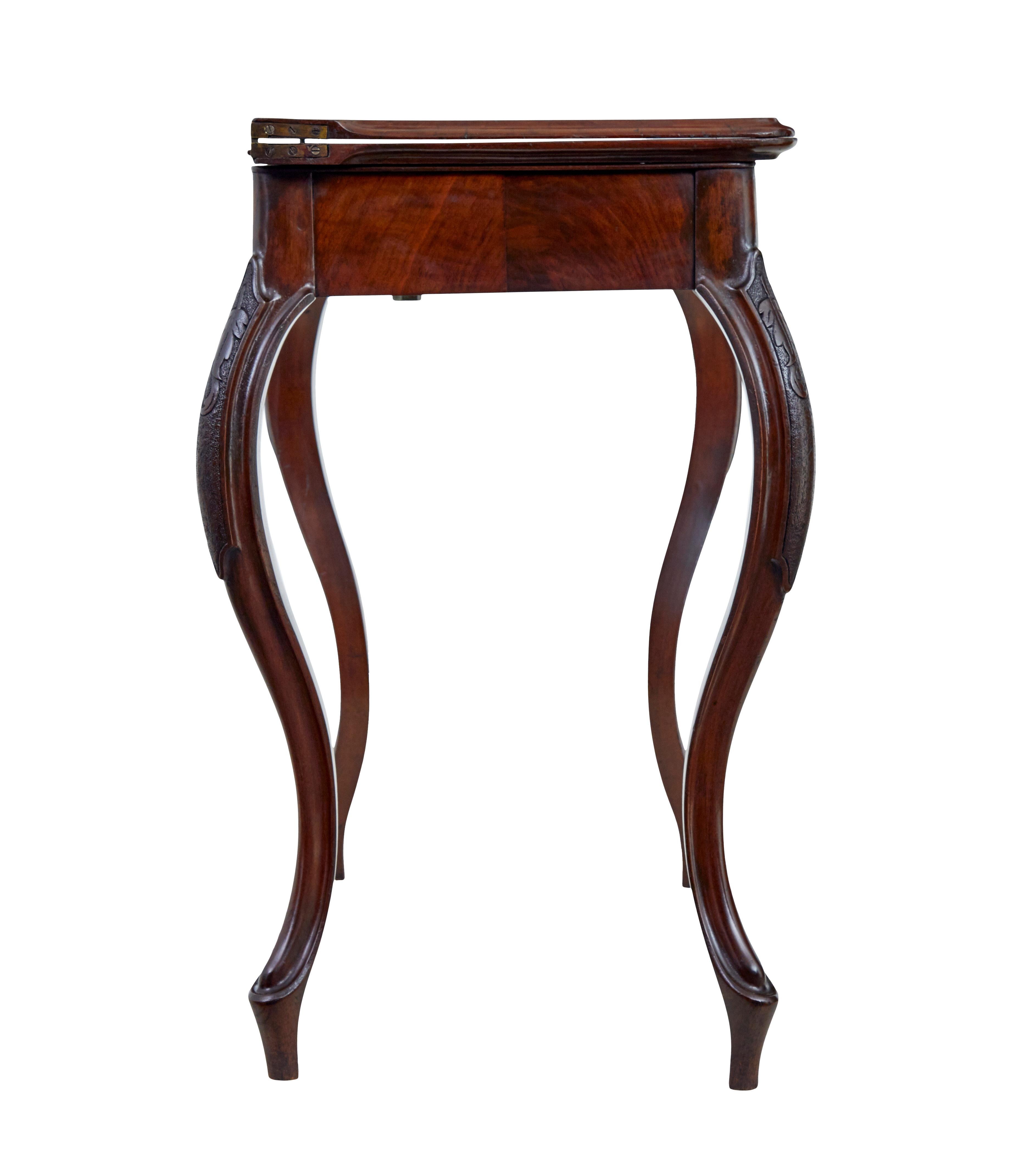 English 19th century carved mahogany games table