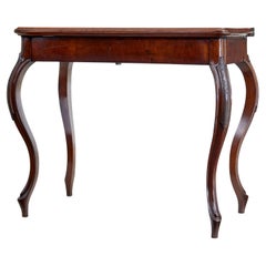 19th century carved mahogany games table