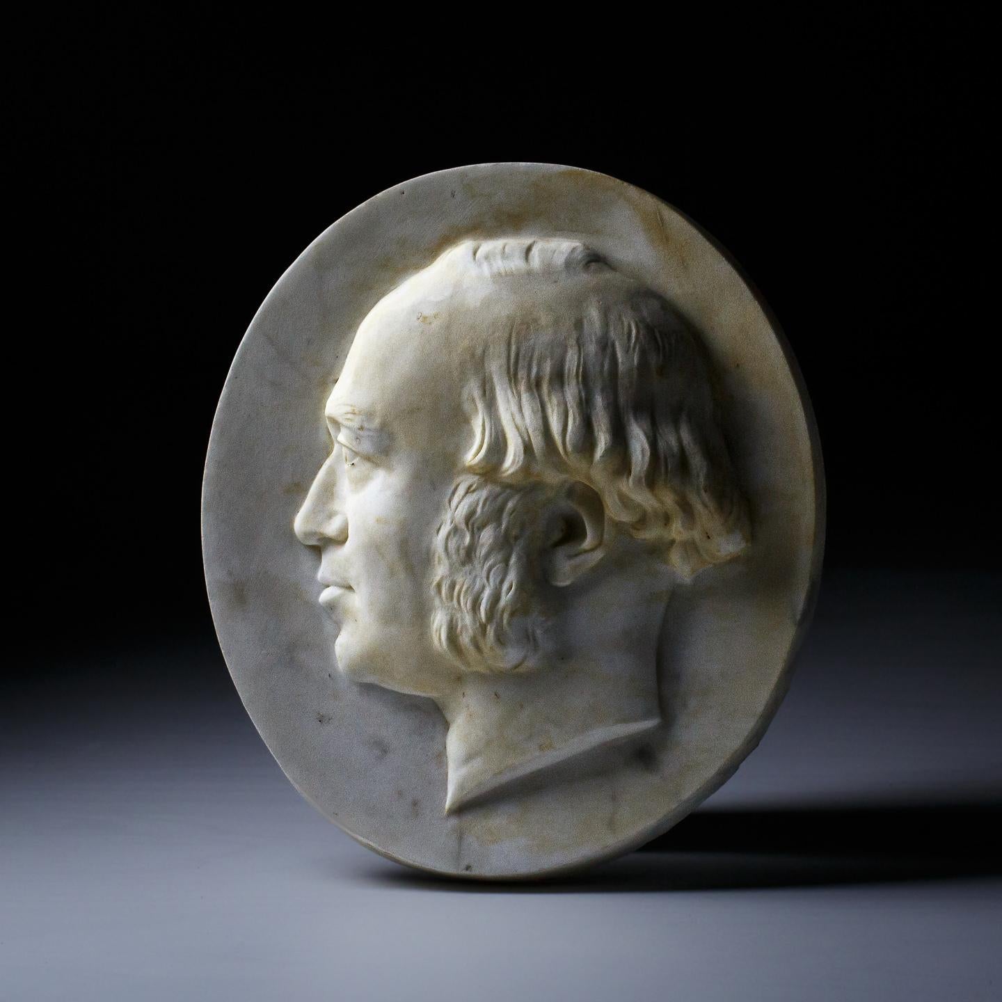 Well executed carved marble portrait tablet of a Gentleman. Deep bold carving. Good patination, excellent condition. England Circa 1840.