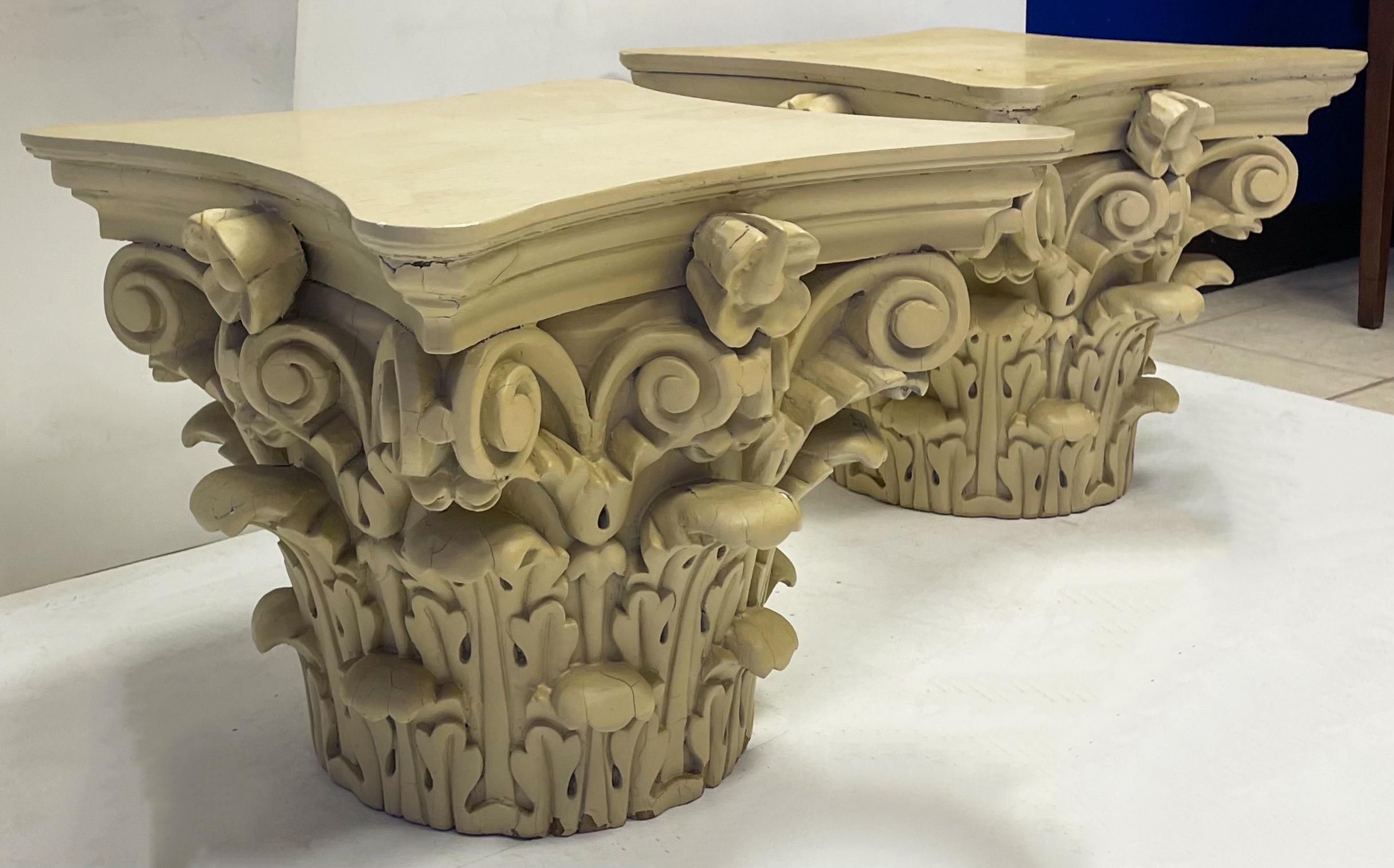 This is a pair of large scale neo- classical style 19th century painted capitals. This continental pair do have some chippiness to the paint.