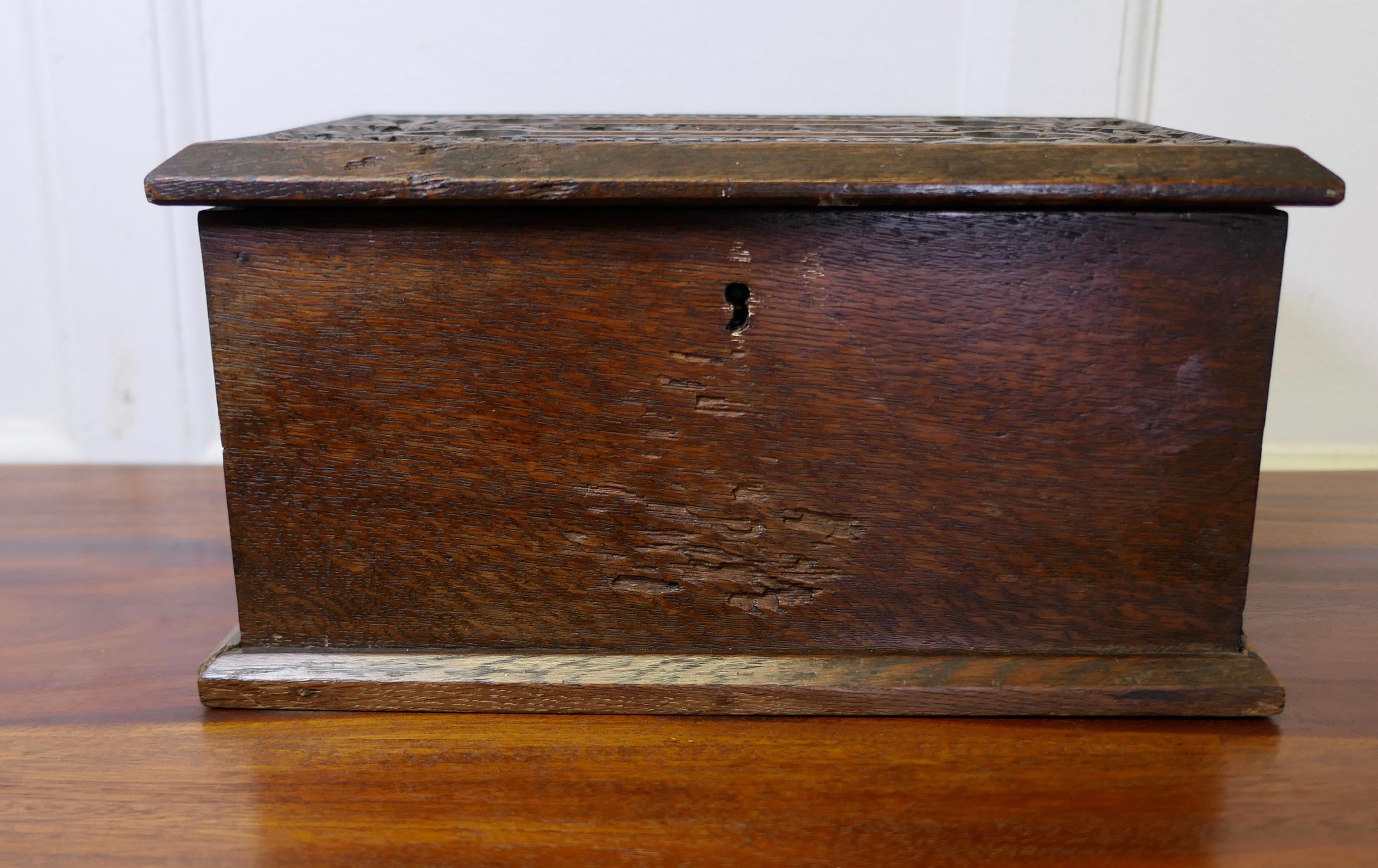 19th Century Carved Oak Correspondence, Post or Letter Box

This very attractive Carved Box is made in Oak, it is carved on the top with 2 letter slots, one for UNANSWERED and the other for ANSWERED letters
The interior has 2 dividers to keep the