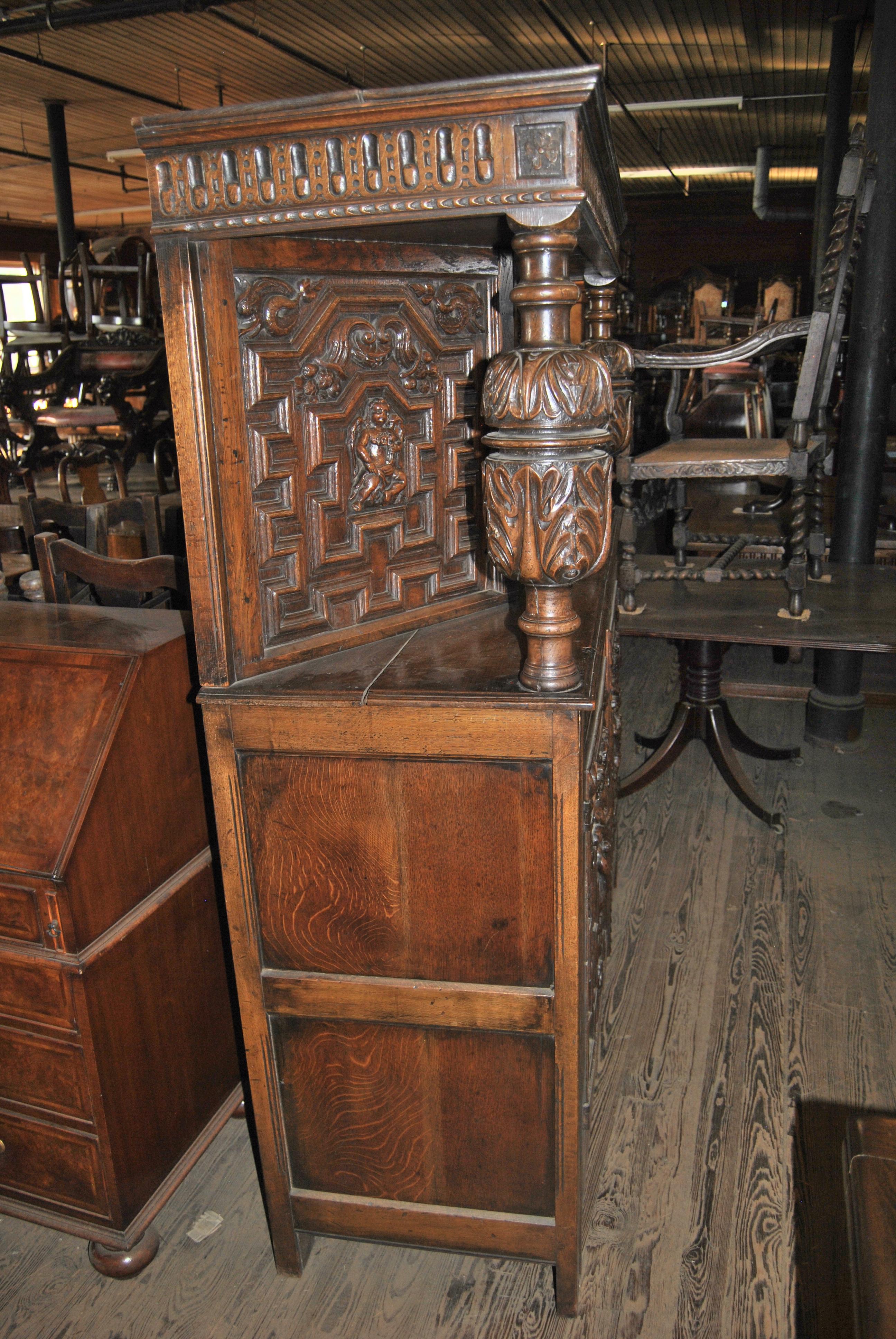 English 19th Century Carved Oak Court Cupboard For Sale