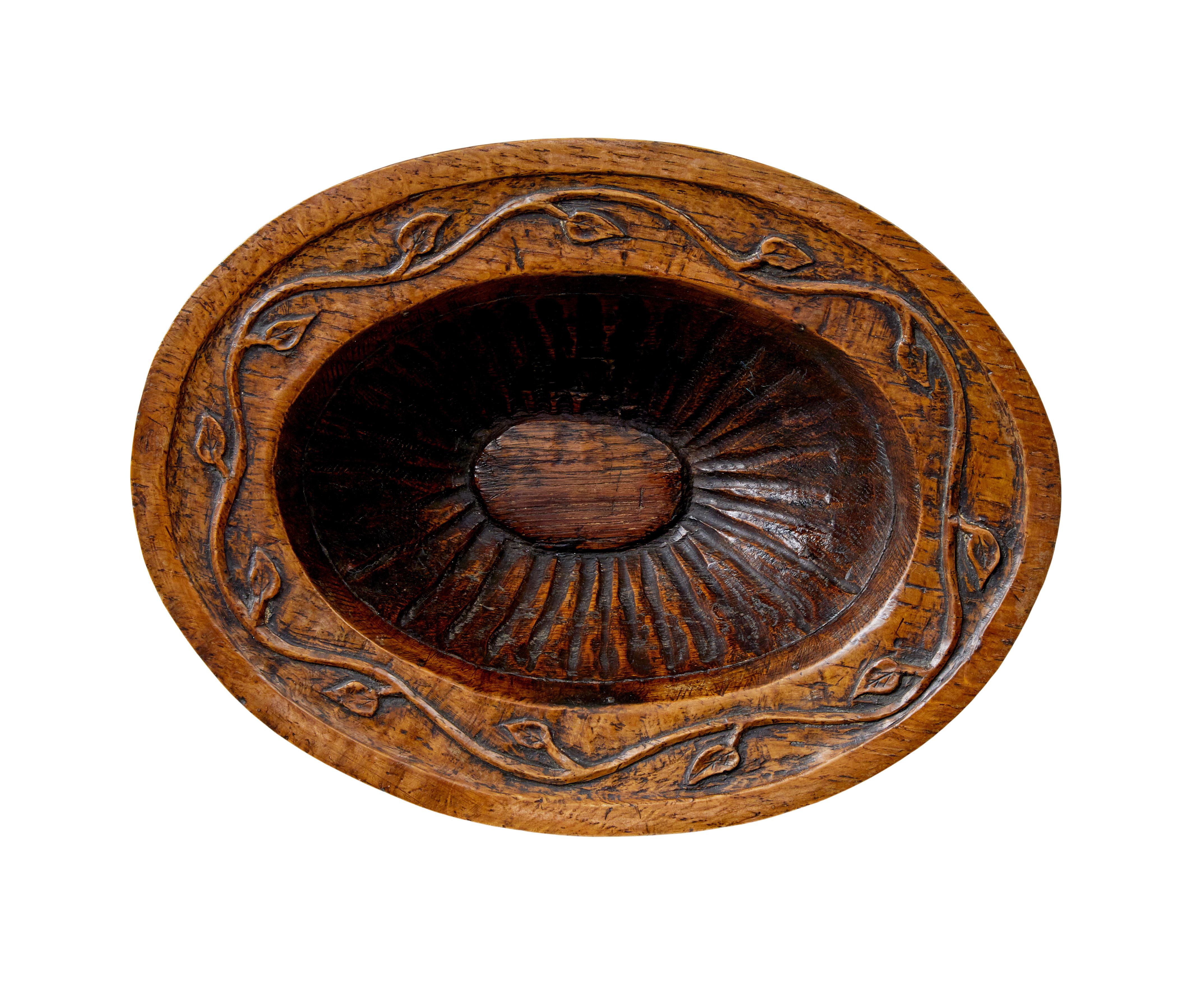 Carved 19th century carved oak liege bowl For Sale
