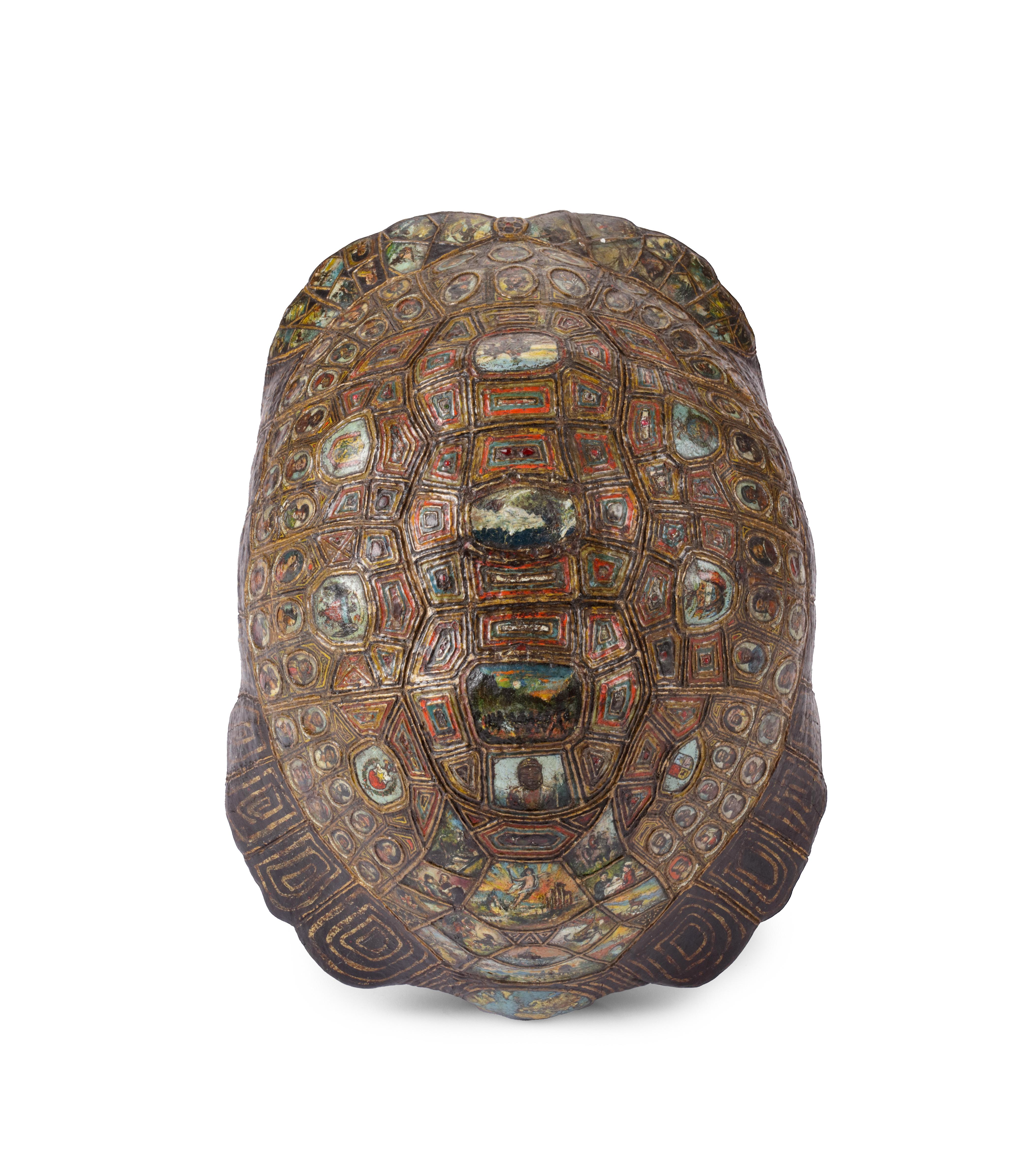 A highly unusual carved painted, gilt and gem-set tortoise carapace resembling the mythical Cosmic or World-bearing Turtle

Probably Germany, late 19th century

L. 32 x W. 26 x H. 20 cm

Provenance:
Private collection, Munich

Following the natural