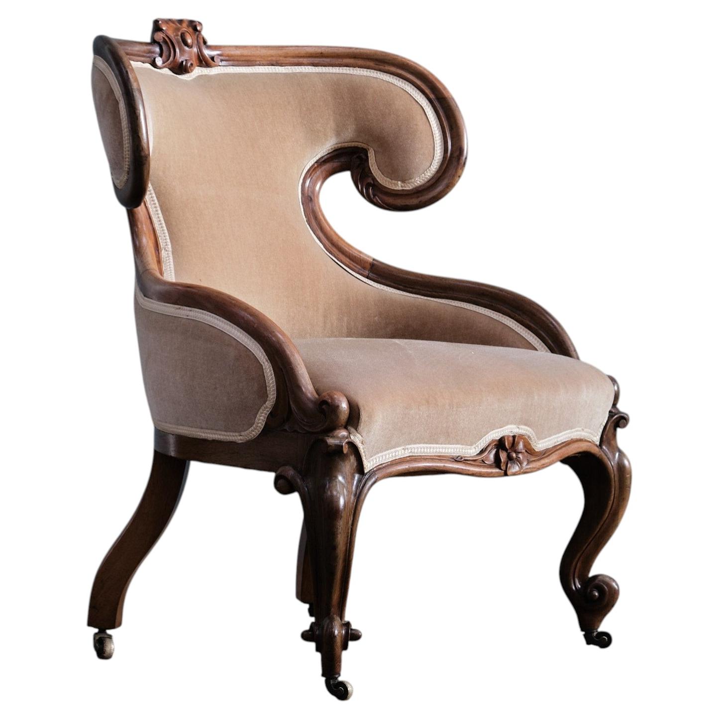 Fauteuil en bois de rose sculpté du XIXe siècle