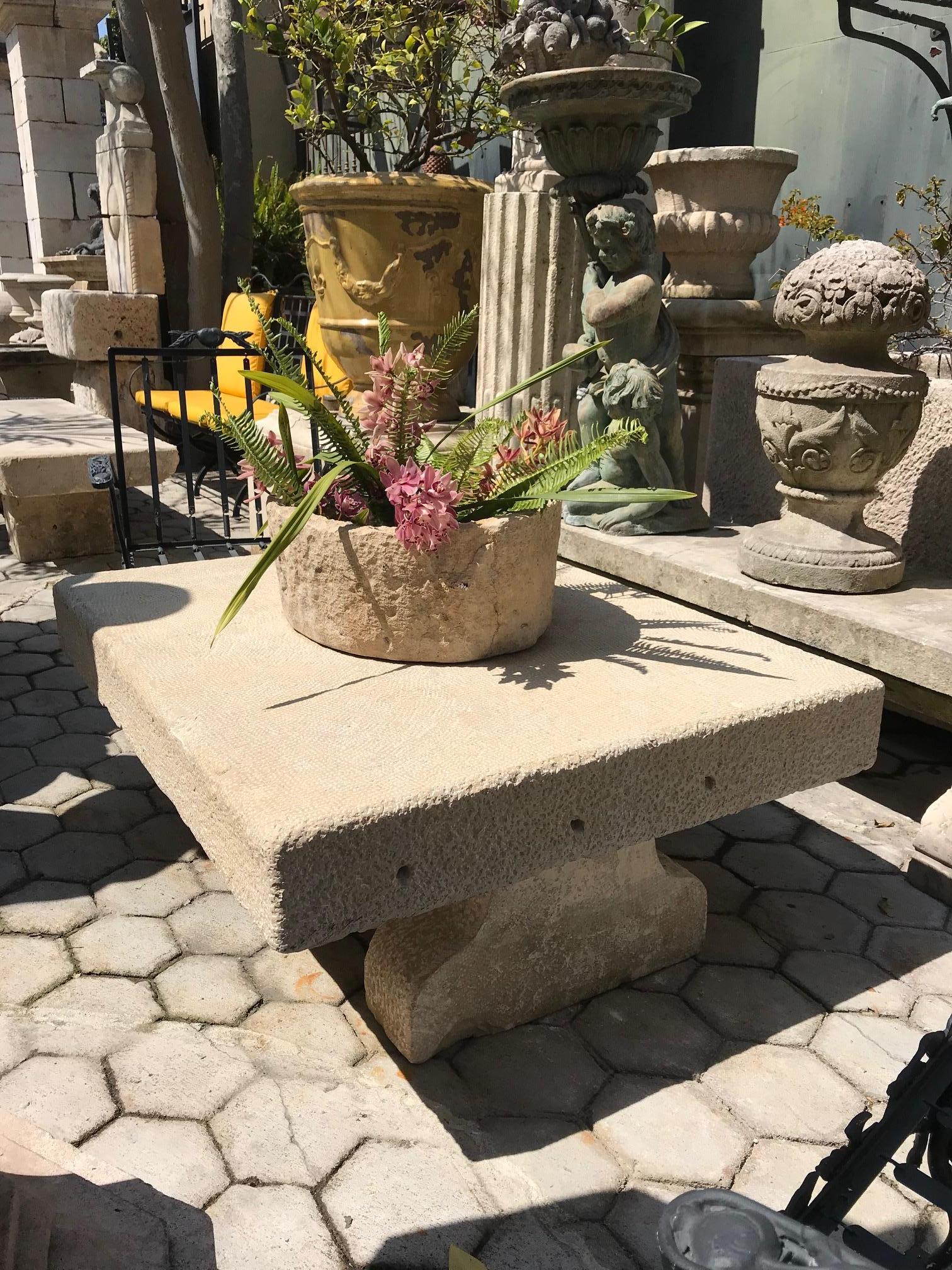 19th-early 20th elements carved stone antique garden low coffee outdoor indoor table. It will be the perfect touch by an outdoor fireplace, This table has a lot of charm and character. It can work in a Mid-Century Modern or an old charm rustic