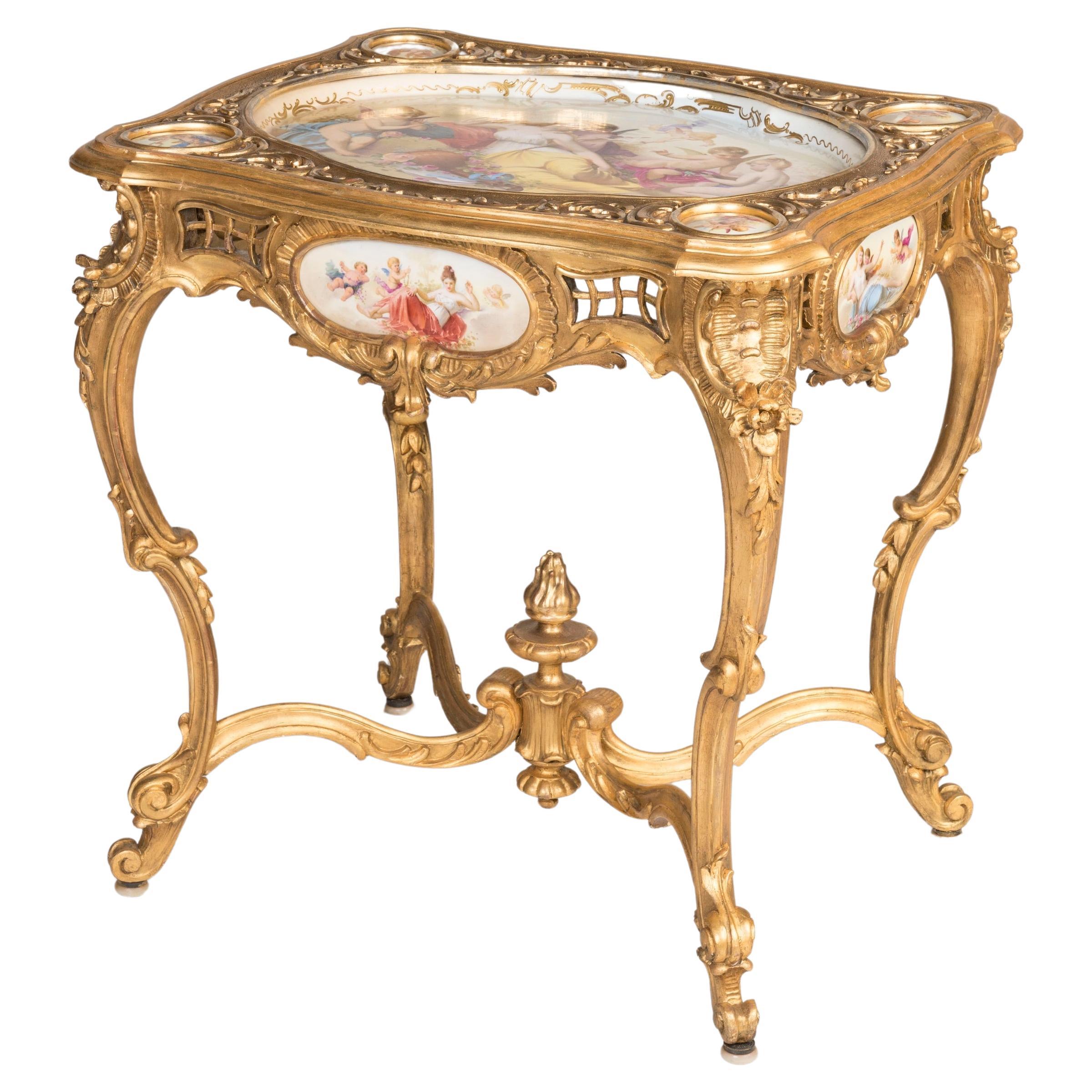 Table sculptée du 19ème siècle de style Louis XV avec panneaux en porcelaine en vente