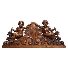 19th Century Carved Walnut Crown Piece or Crest with Coat of Arms and Putti