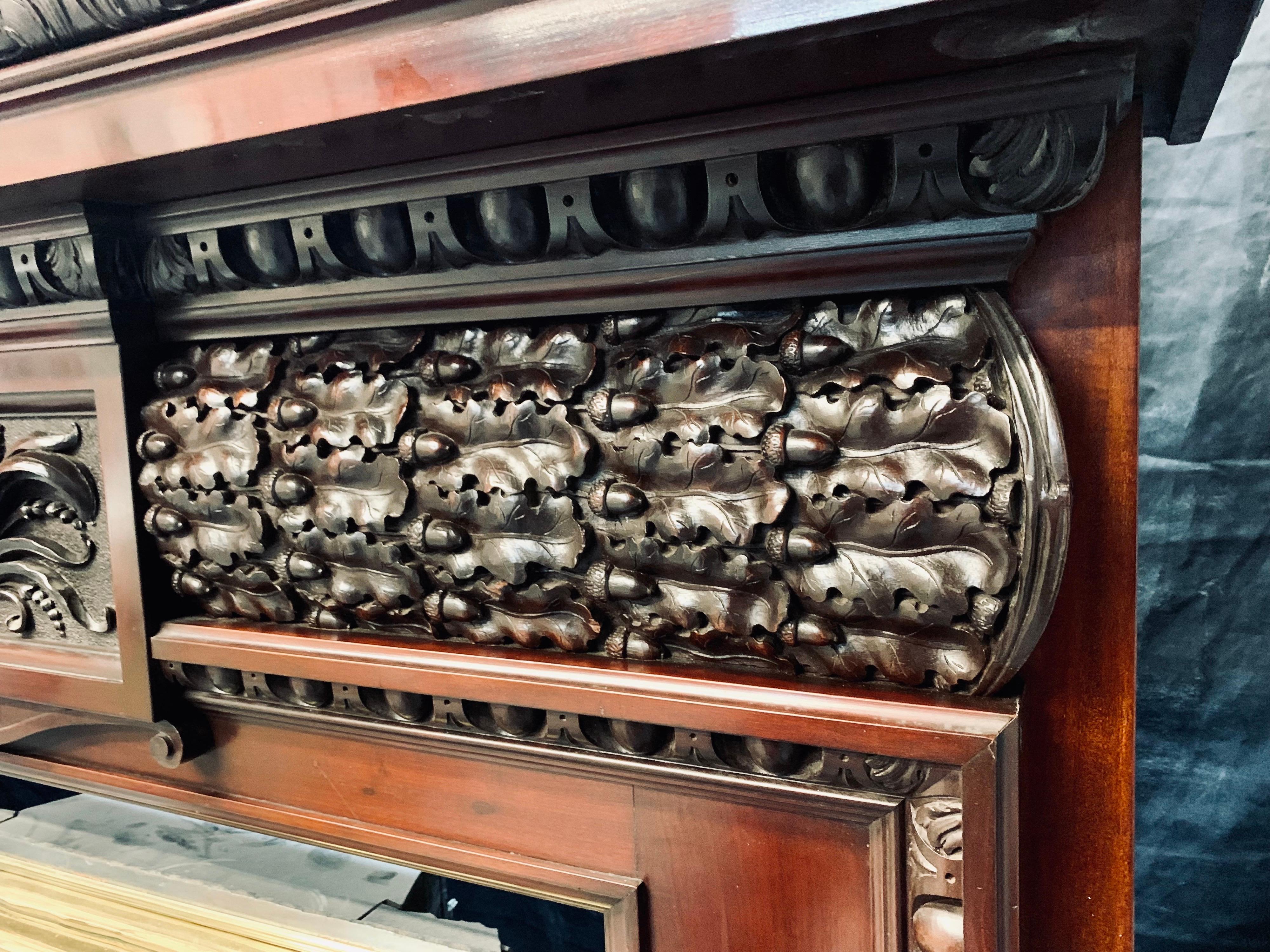 English 19th Century Carved Walnut Fireplace Surround For Sale