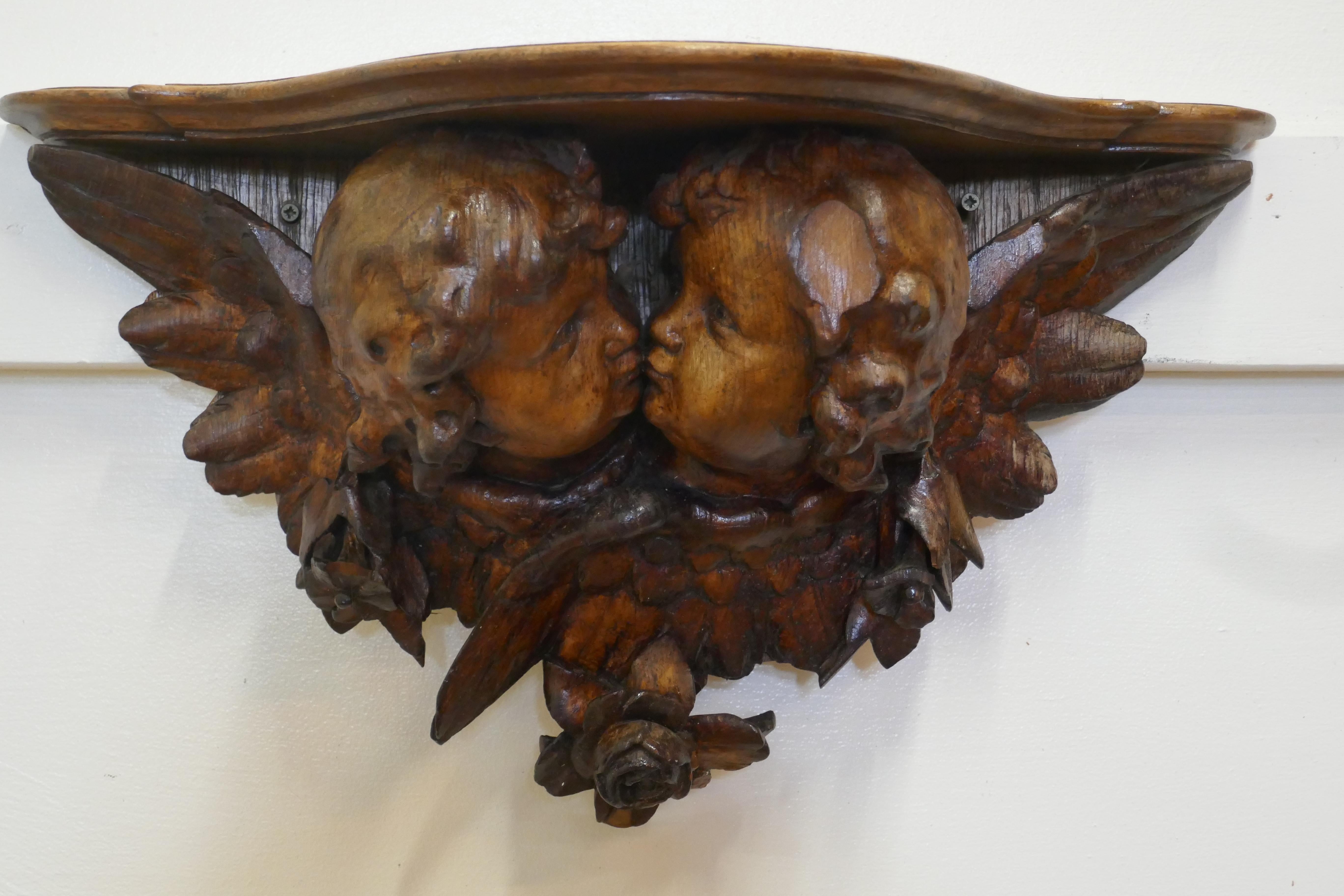 19th Century Carved Wood Cherub Wall Bracket


This is a beautifully carved piece, depicting 2 kissing Putti or Cherubs, showing their wings at the sides . The carving is well executed and in perfect detail, there is one chip on the hair of the