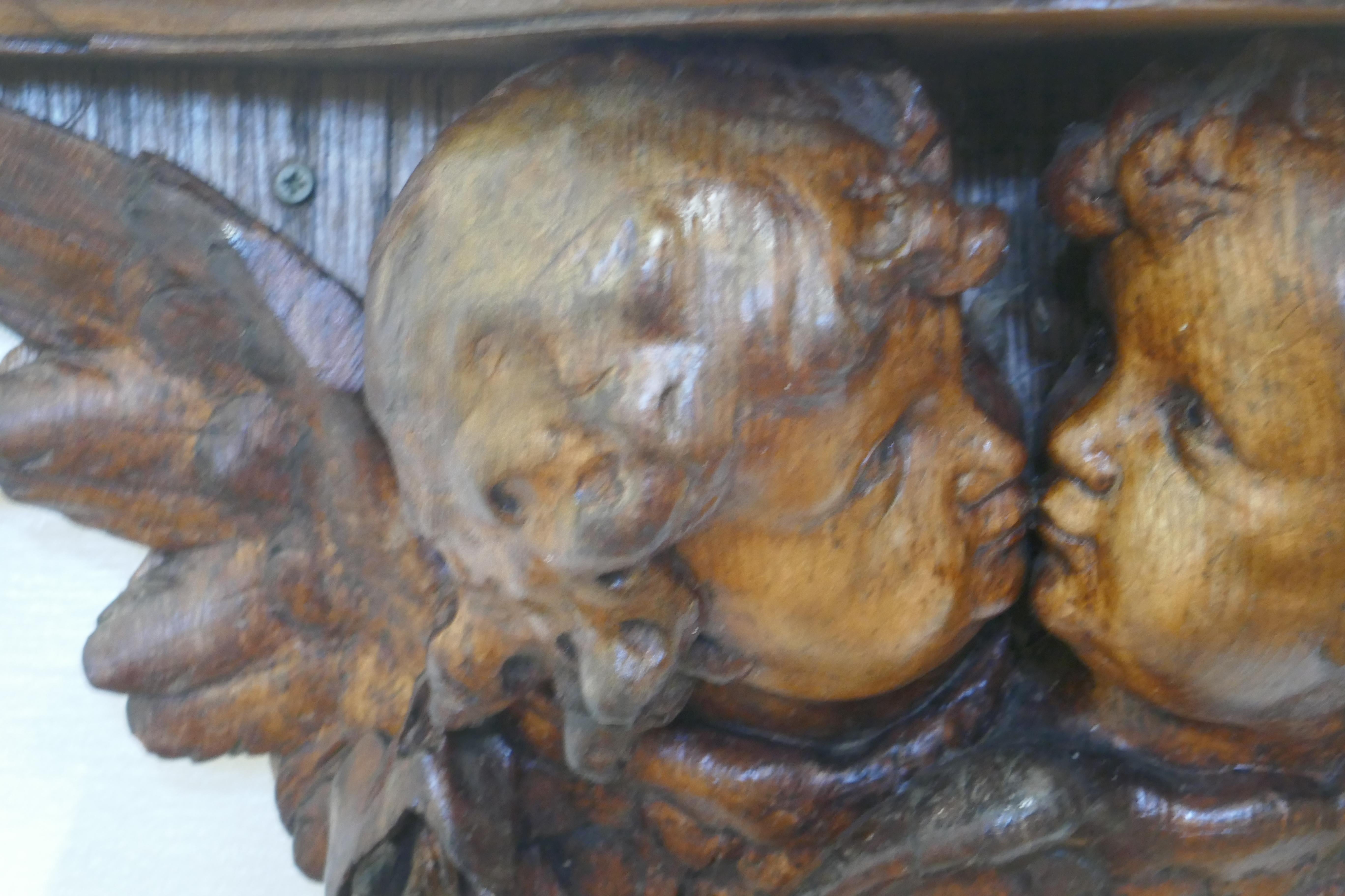 Support mural en bois sculpté représentant un chérubin, XIXe siècle en vente 1