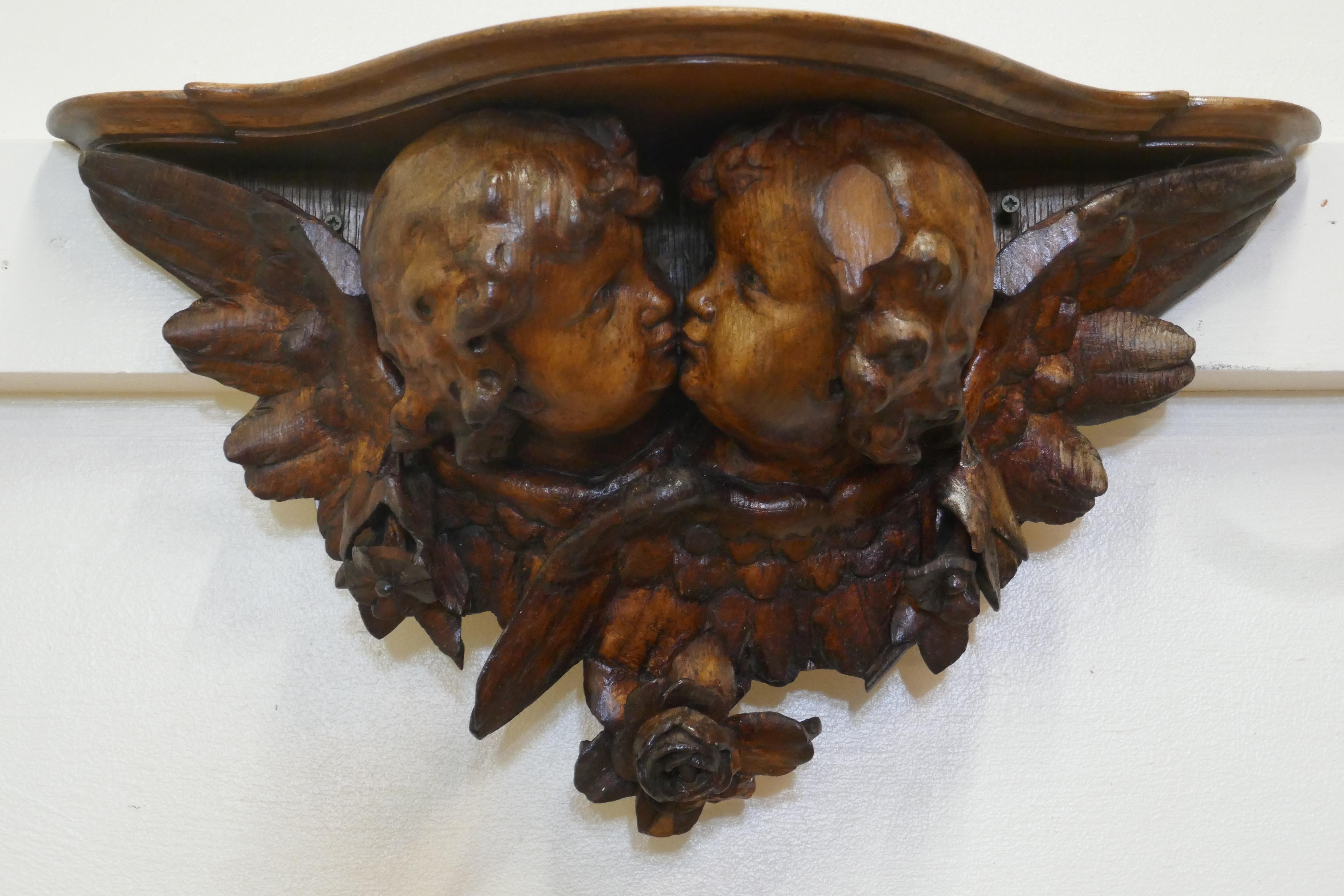 Support mural en bois sculpté représentant un chérubin, XIXe siècle en vente 2