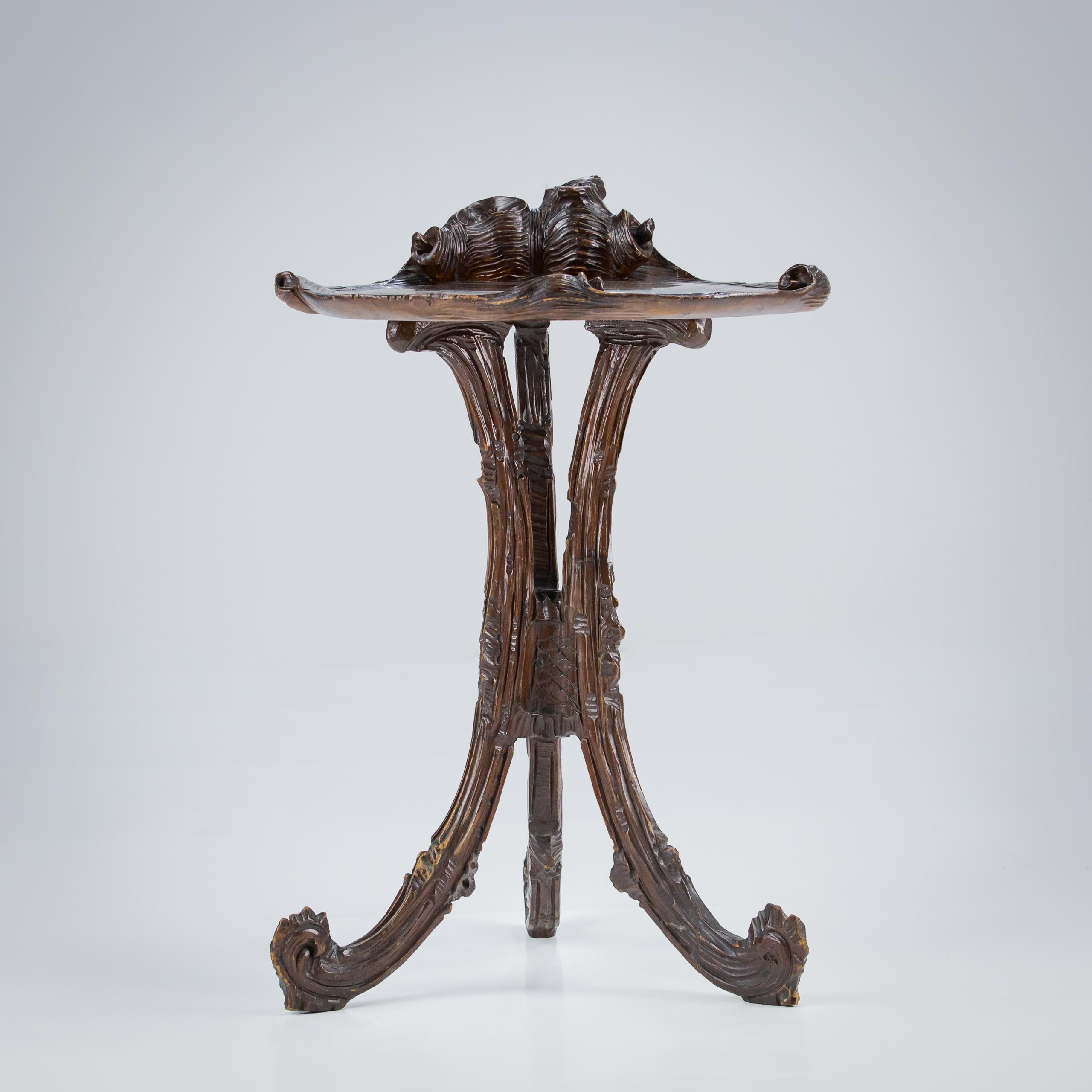 Late 19th Century Carved wood Grotto Side Table, Impressive intricate naturalistic carved decorating of shells, bark and faux bois. Excellent Patination. Historical repairs Italy Circa 1880