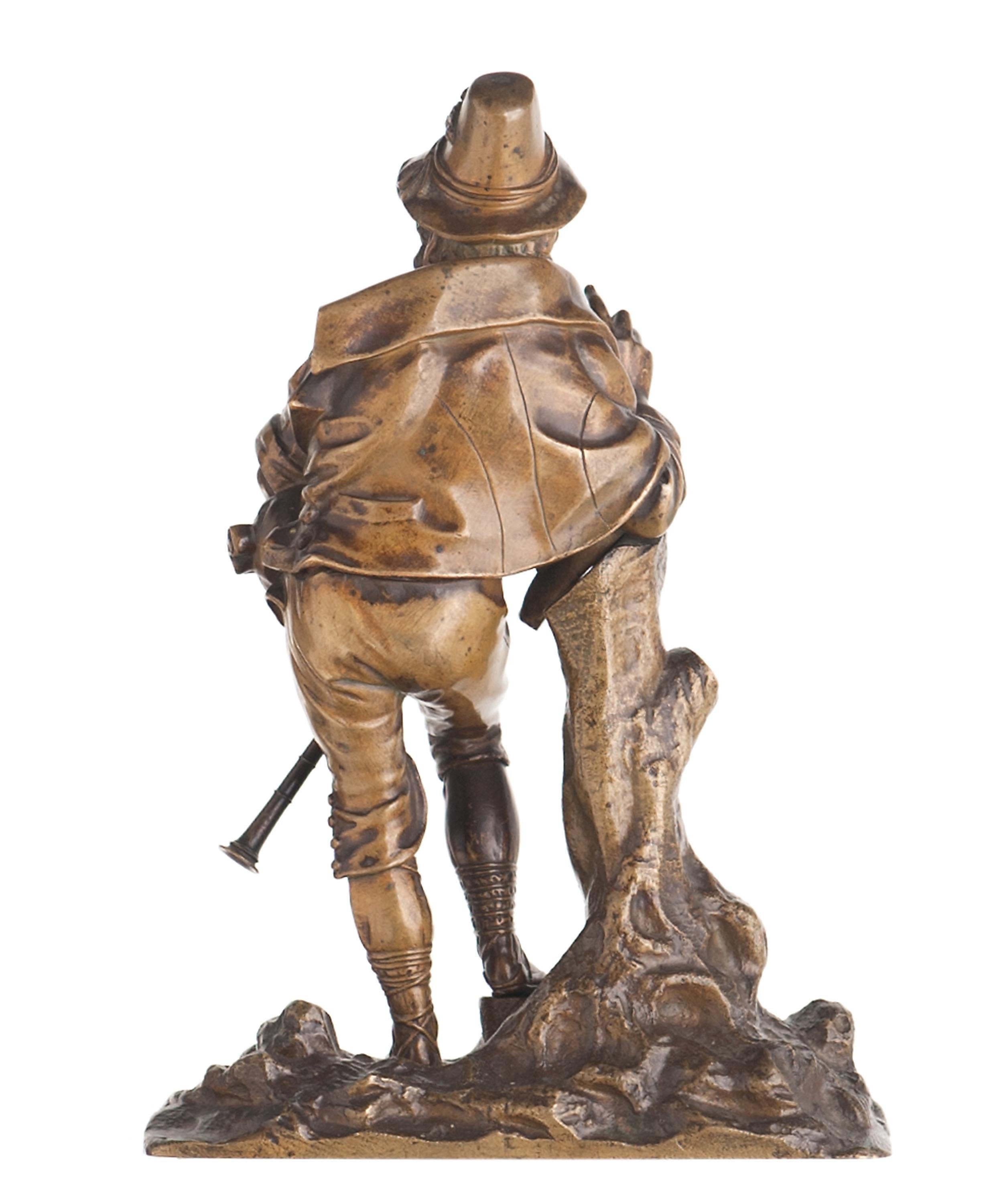 Cast bronze sculpture of playful dancing peasant playing a bagpipe. The model is after Celestin Anatole Calmels. (French 1822-1908)

 Head covered by a hat
 On integral circular base.
 