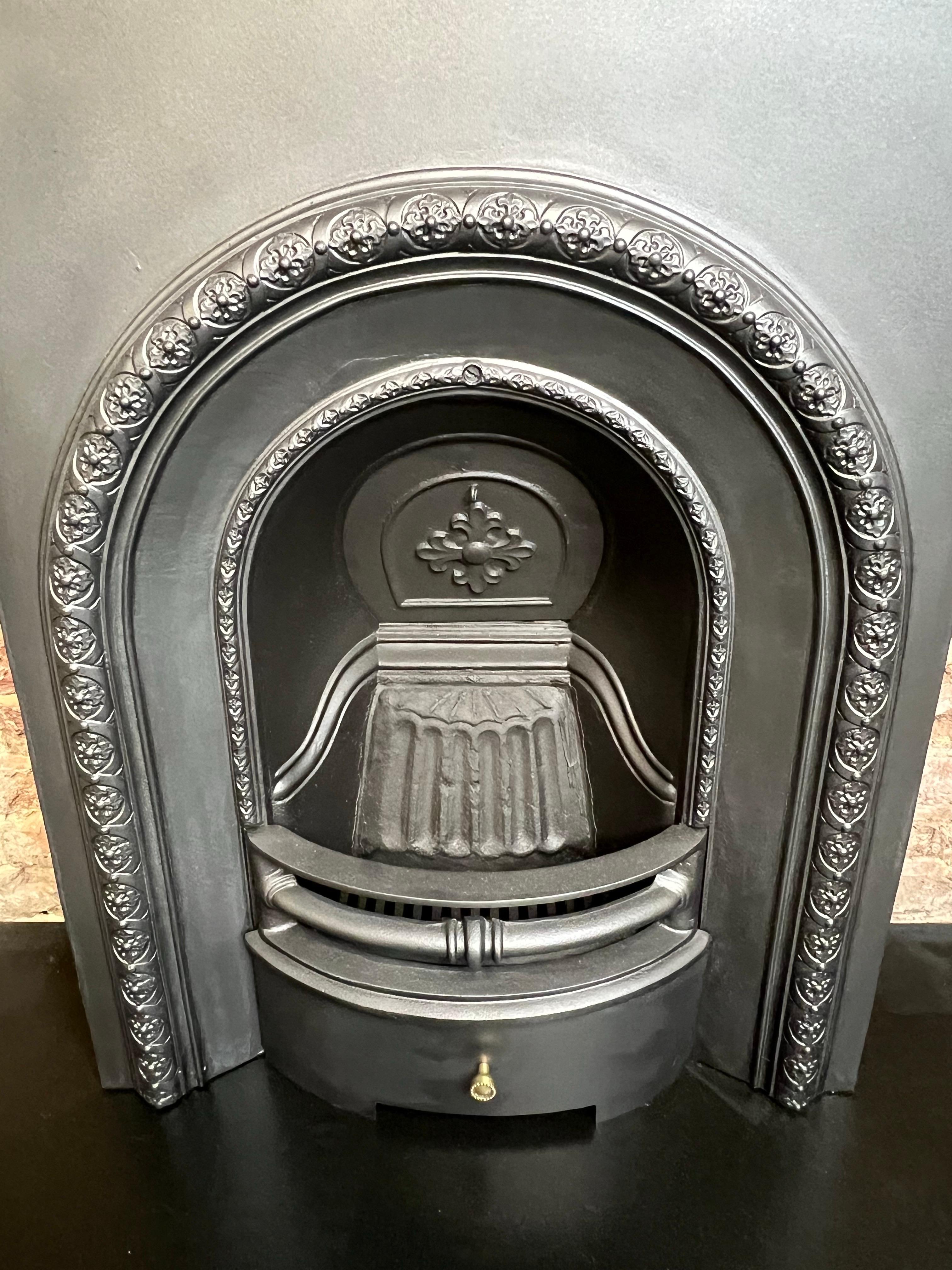 Blackened 19th Century Cast Iron Arch Fireplace Insert For Sale